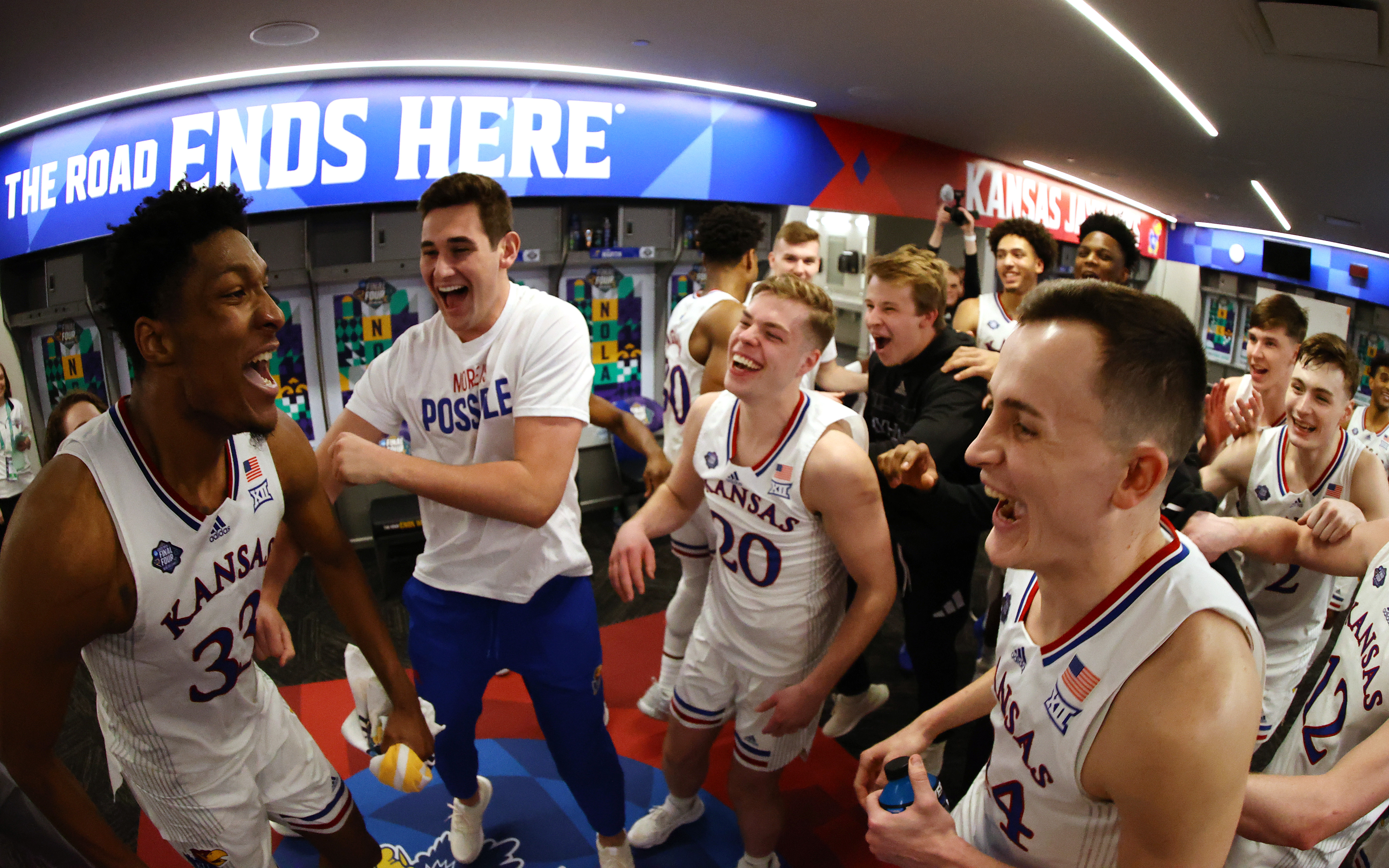 NEW ORLEANS, LOUISIANA - APRIL 02: David McCormack #33 of the Kansas Jayhawks celebrates with his teammates after defeating the Villanova Wildcats in the semifinal game of the 2022 NCAA Men's Basketball Tournament Final Four at Caesars Superdome on April 02, 2022 in New Orleans, Louisiana. (Photo by Jamie Schwaberow/NCAA Photos via Getty Images)