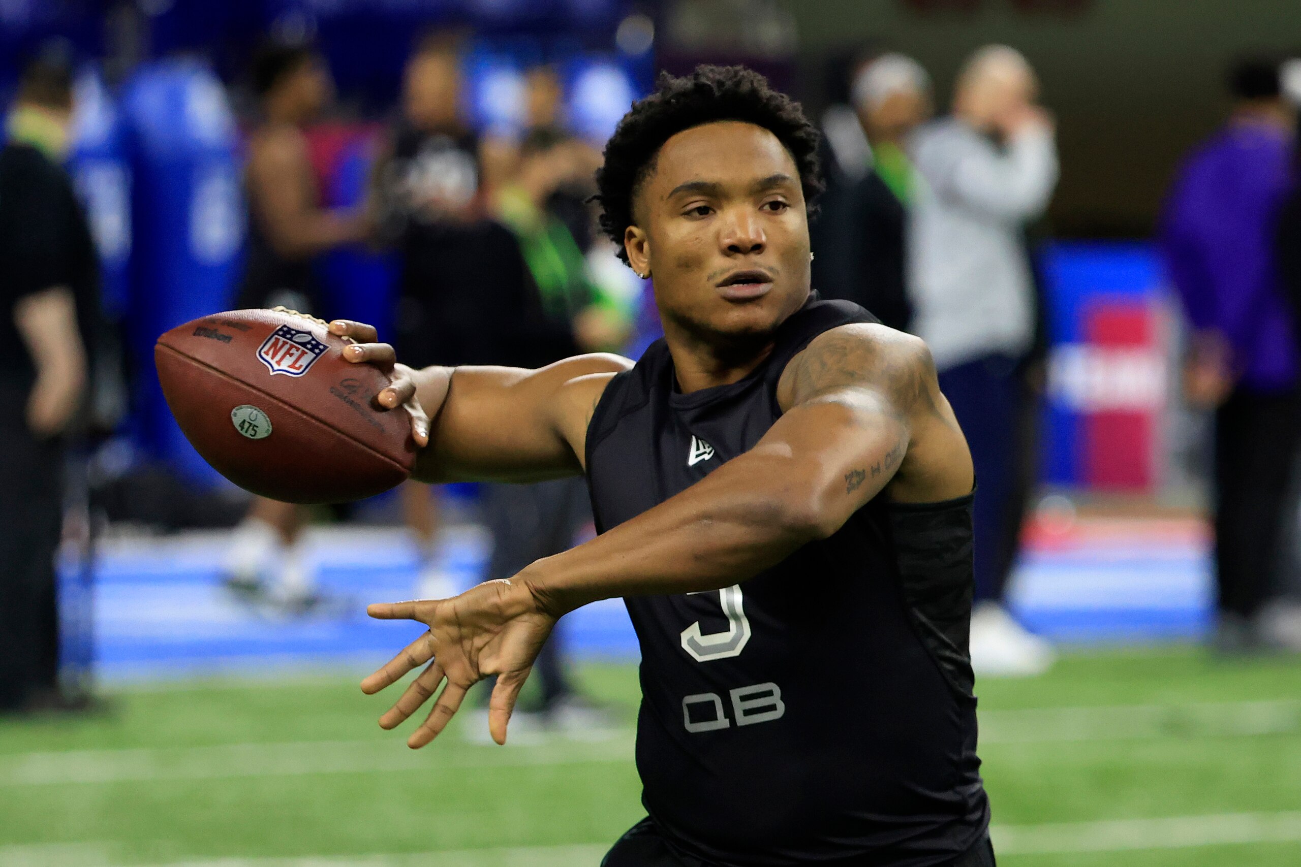 INDIANAPOLIS, INDIANA - MARCH 03: D'Eriq King #QB09 of the Miami throws during the NFL Combine at Lucas Oil Stadium on March 03, 2022 in Indianapolis, Indiana. (Photo by Justin Casterline/Getty Images)