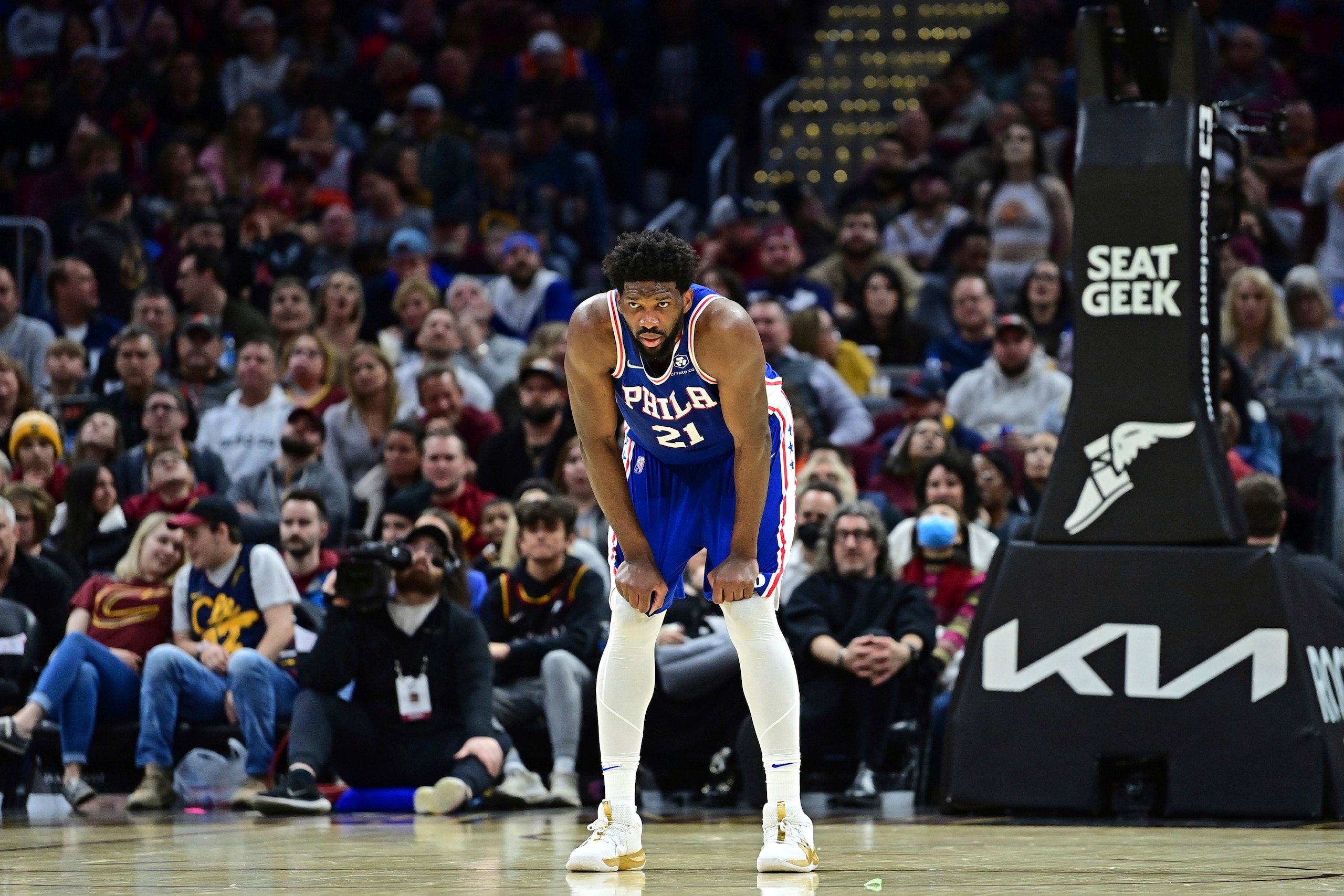 Philadelphia 76ers center Joel Embiid stands in the second half of an NBA basketball game against the Cleveland Cavaliers, Sunday, April 3, 2022, in Cleveland. The 76ers won 112-108. (AP Photo/David Dermer)