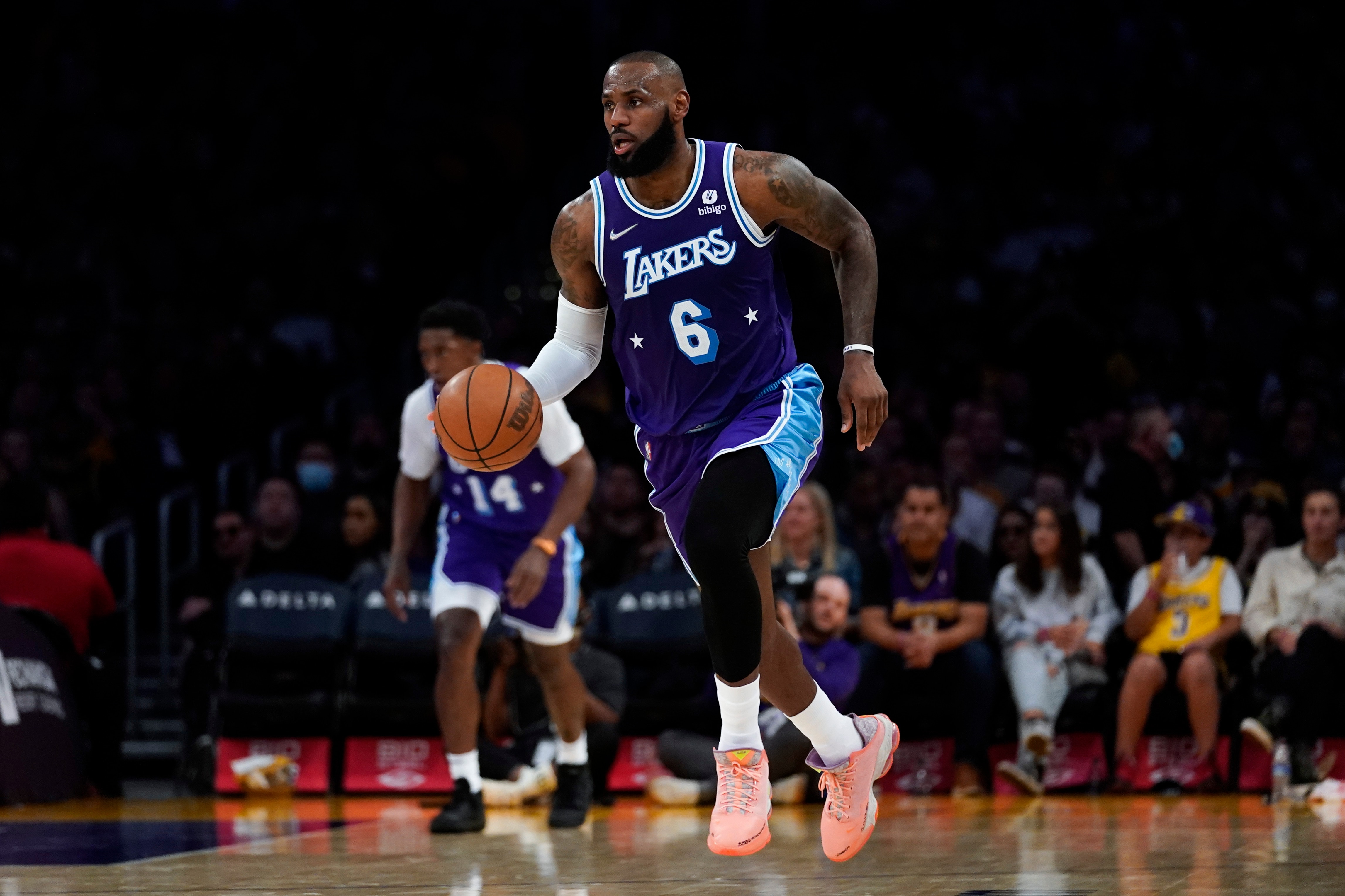 Los Angeles Lakers forward LeBron James (6) controls the ball during an NBA basketball game against the New Orleans Pelicans in Los Angeles, Friday, April 1, 2022. (AP Photo/Ashley Landis)