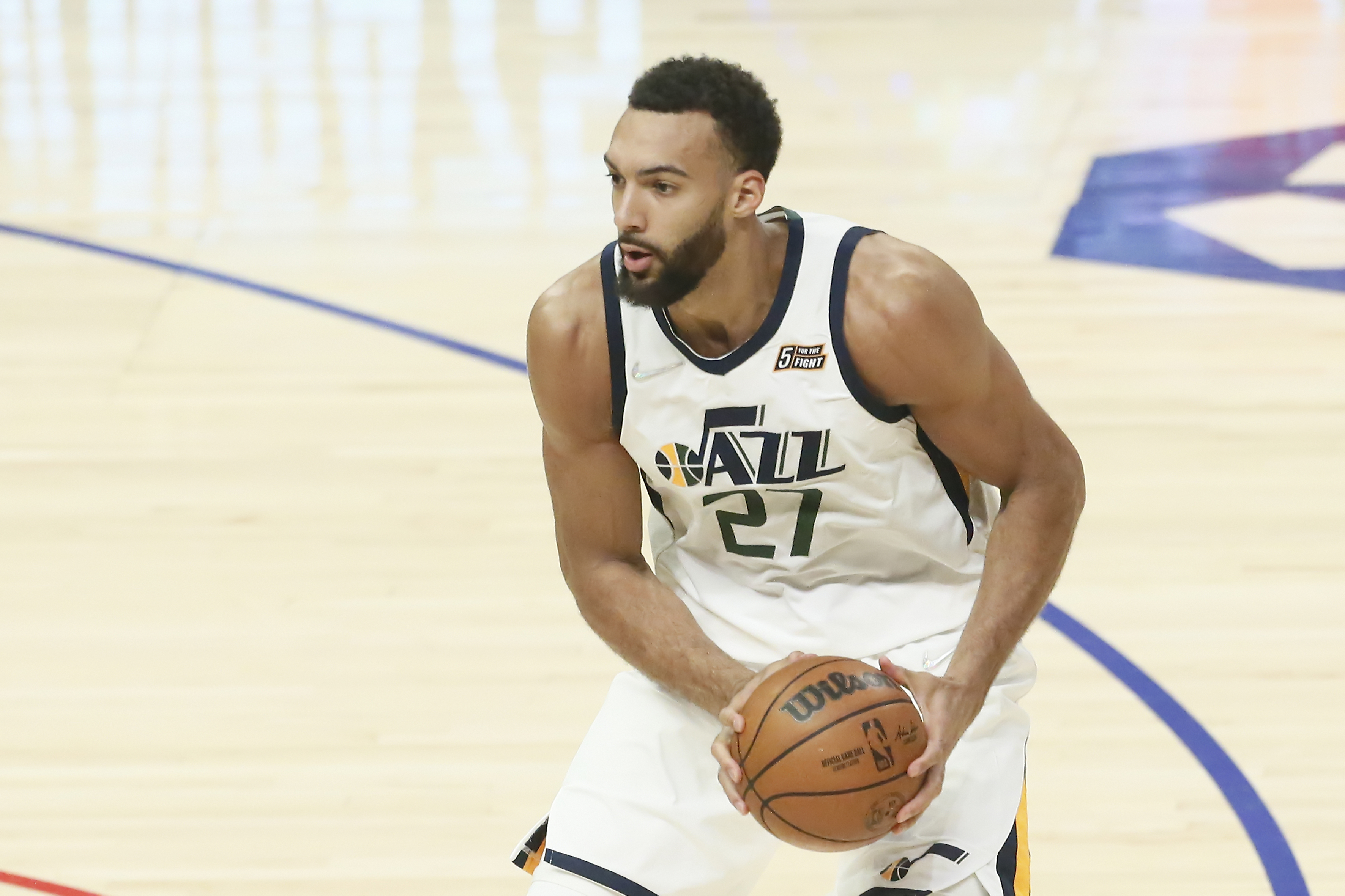 LOS ANGELES, CA - MARCH 29: Rudy Gobert #27 of the Utah Jazz dribbles the ball during a game at the Crypto.com Arena on March 29, 2022 in Los Angeles, California. NOTE TO USER: User expressly acknowledges and agrees that, by downloading and or using this photograph, User is consenting to the terms and conditions of the Getty Images License Agreement. Mandatory Credit: 2022 NBAE (Photo by Chris Elise/NBAE via Getty Images)