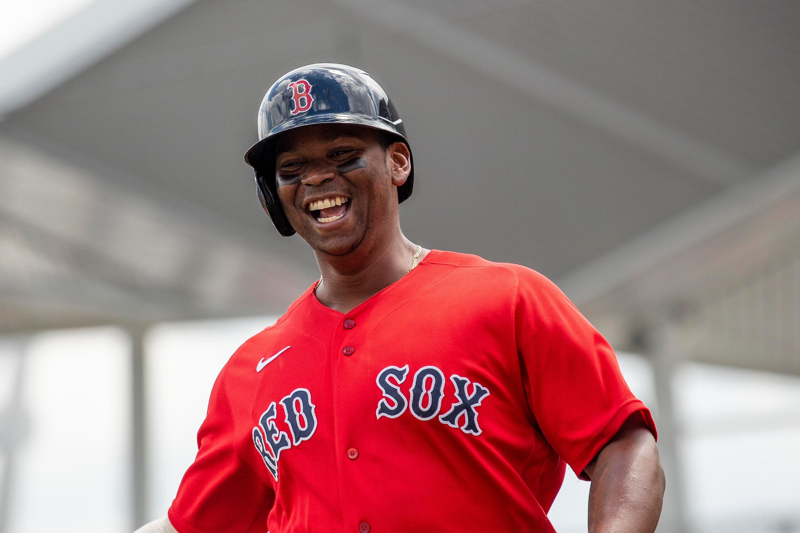 FT. MYERS, FL - MARCH 31: Rafael Devers #11 of the Boston Red Sox reacts after hitting a solo home run during the first inning of a Grapefruit League game against the Minnesota Twins on March 31, 2022 at jetBlue Park at Fenway South in Fort Myers, Florida. (Photo by Billie Weiss/Boston Red Sox/Getty Images)