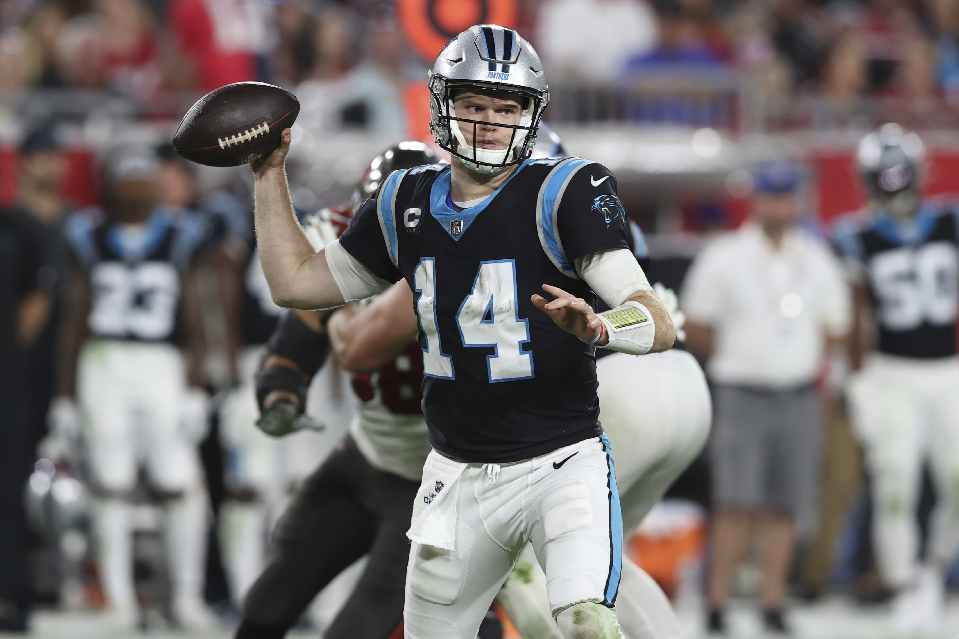 Carolina Panthers quarterback Sam Darnold (14) throws a pass against the Tampa Bay Buccaneers during the second half of an NFL football game Sunday, Jan. 9, 2022, in Tampa, Fla. (AP Photo/Mark LoMoglio)