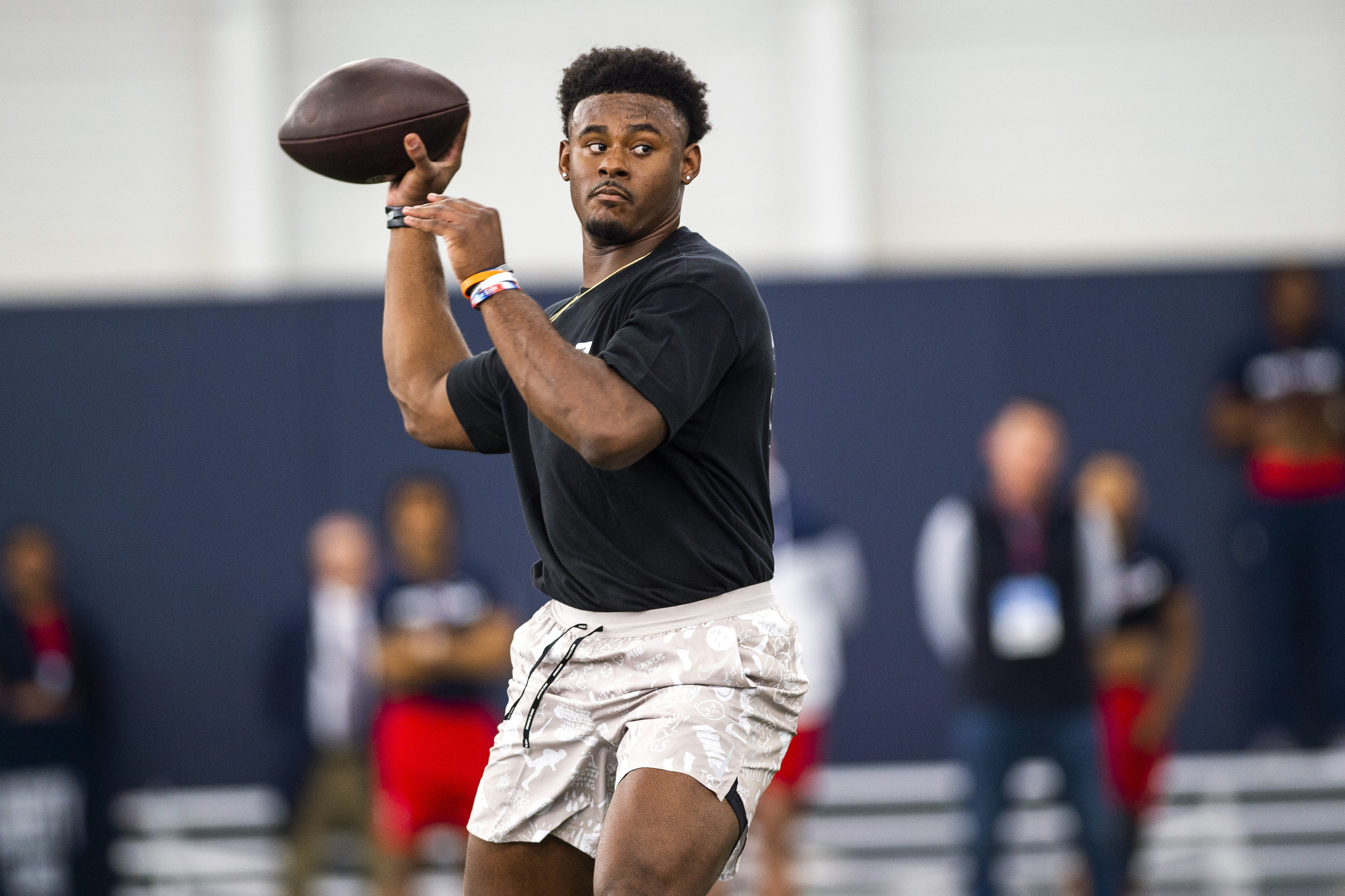 Liberty quarterback Malik Willis throws during the school's pro football day for NFL scouts and coaches, Tuesday, March 22, 2022, in Lynchburg, Va. (AP Photo/Kendall Warner)