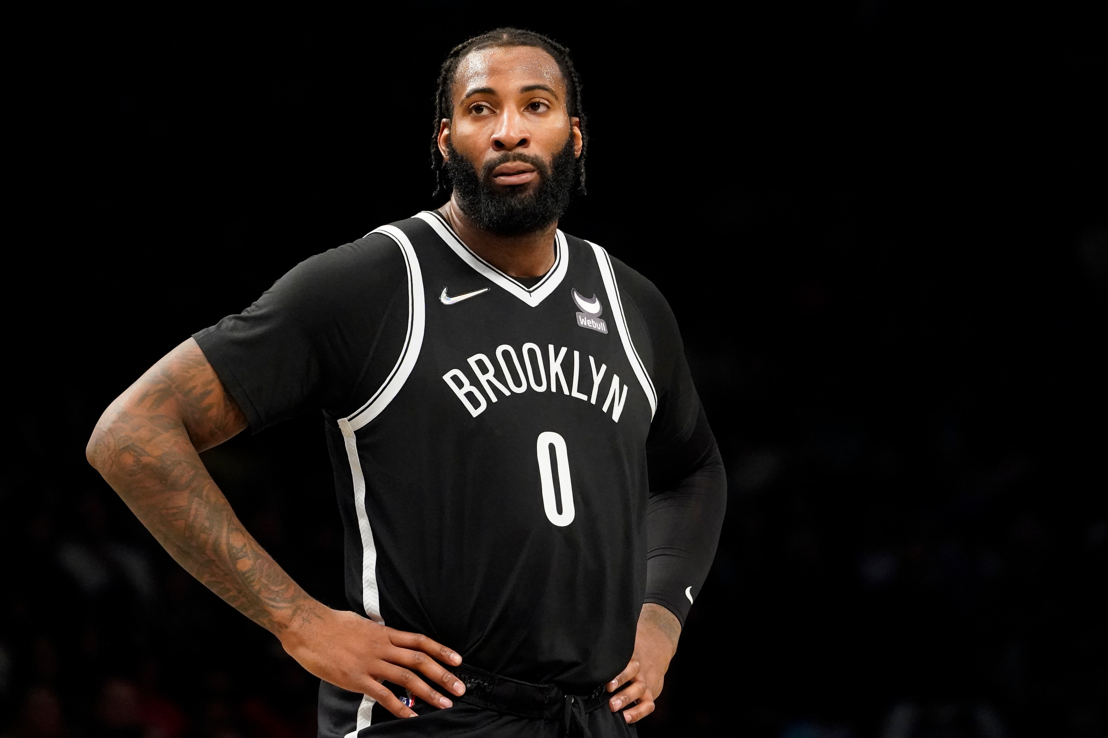 Brooklyn Nets center Andre Drummond (0) stands on the court in the second half of an NBA basketball game against the Charlotte Hornets, Sunday, March 27, 2022, in New York. (AP Photo/John Minchillo)