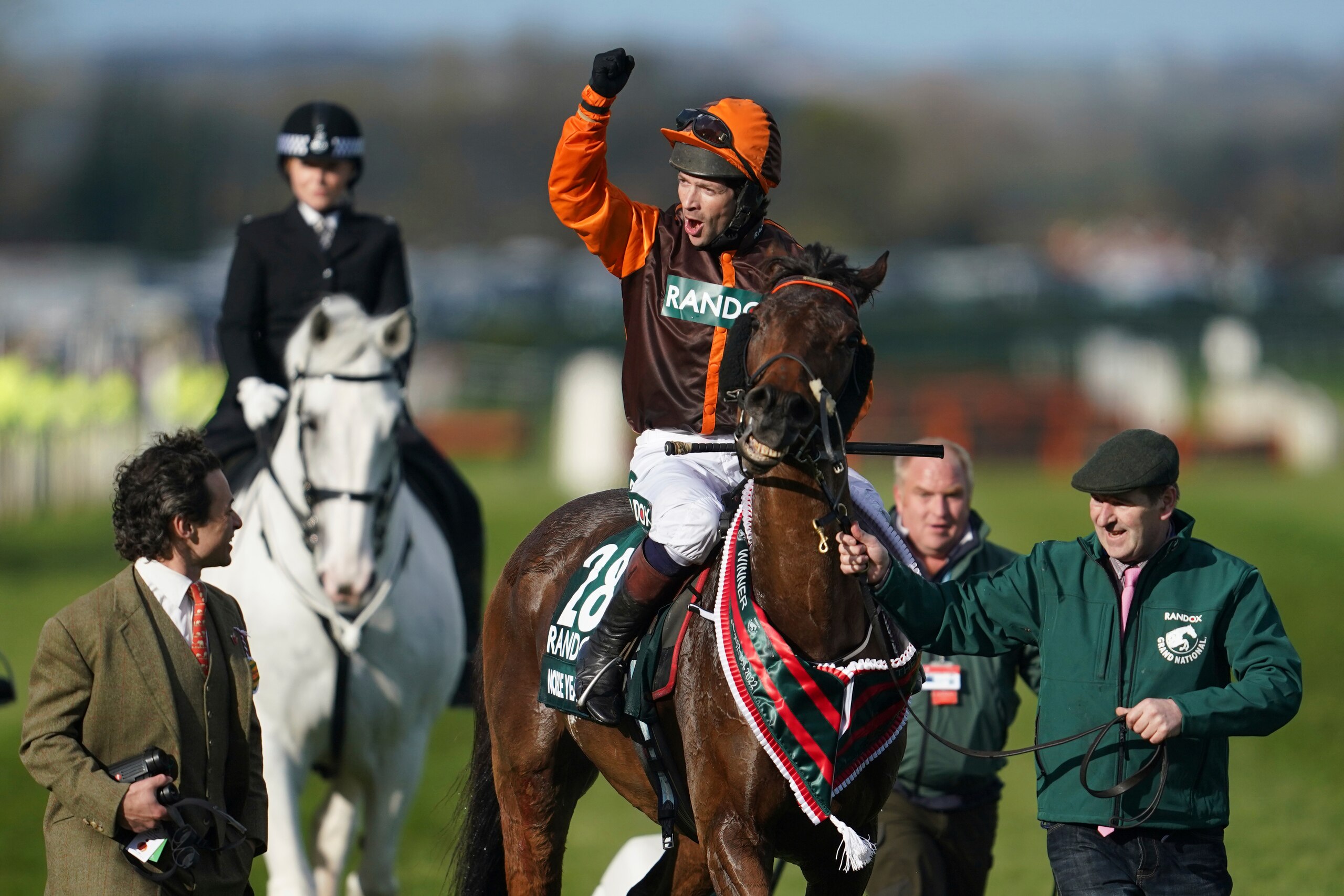Noble Yeats ridden by Sam Waley-Cohen gestures as he celebrates after winning the Grand National horse race at Aintree, Liverpool, England, Saturday, April 9, 2022. The iconic Grand National race which is run over fences is 4 miles, 2 ½ furlongs has its origins in the 1839 Grand Liverpool Steeplechase .(AP Photo/Jon Super)