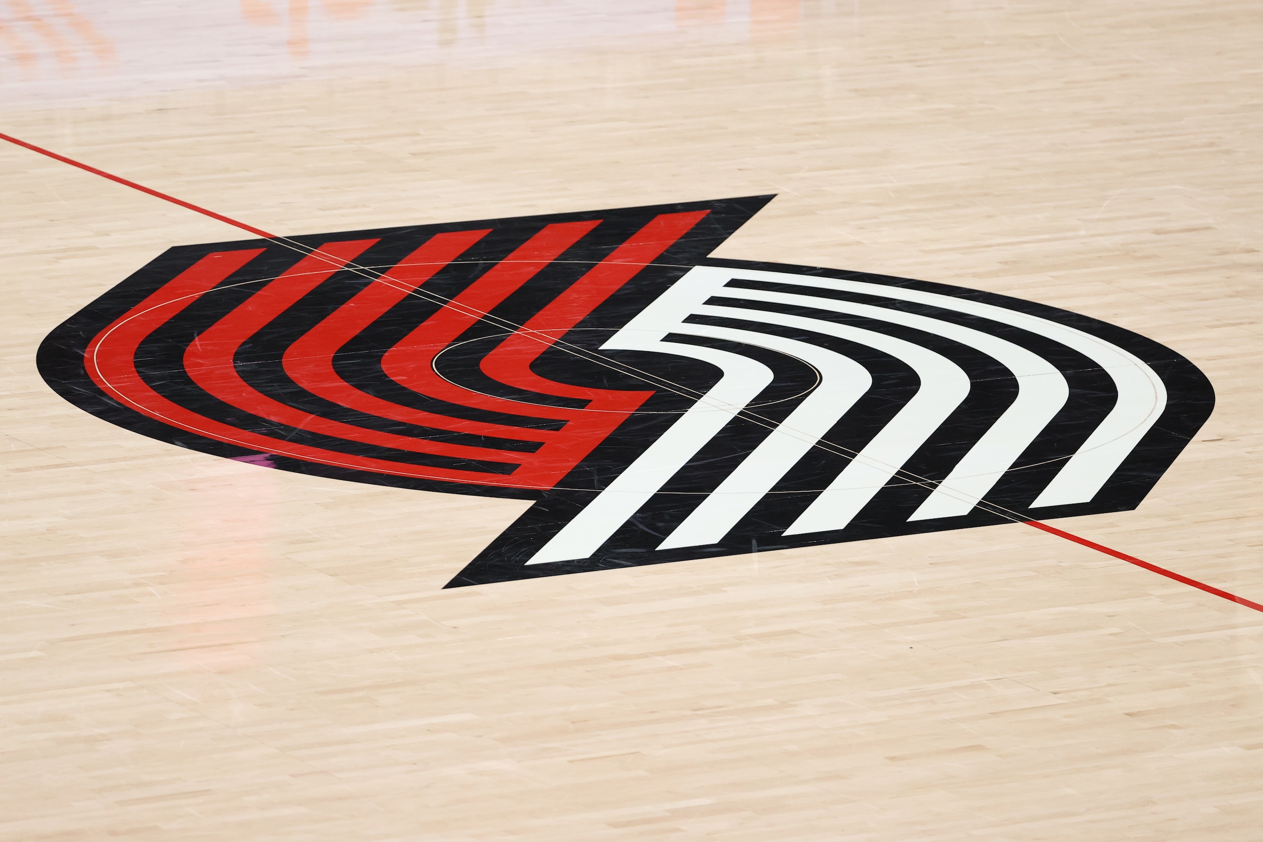 PORTLAND, OREGON - JANUARY 16: A general view of the Portland Trail Blazers logo at Moda Center on January 16, 2021 in Portland, Oregon. NOTE TO USER: User expressly acknowledges and agrees that, by downloading and or using this photograph, User is consenting to the terms and conditions of the Getty Images License Agreement. (Photo by Abbie Parr/Getty Images)