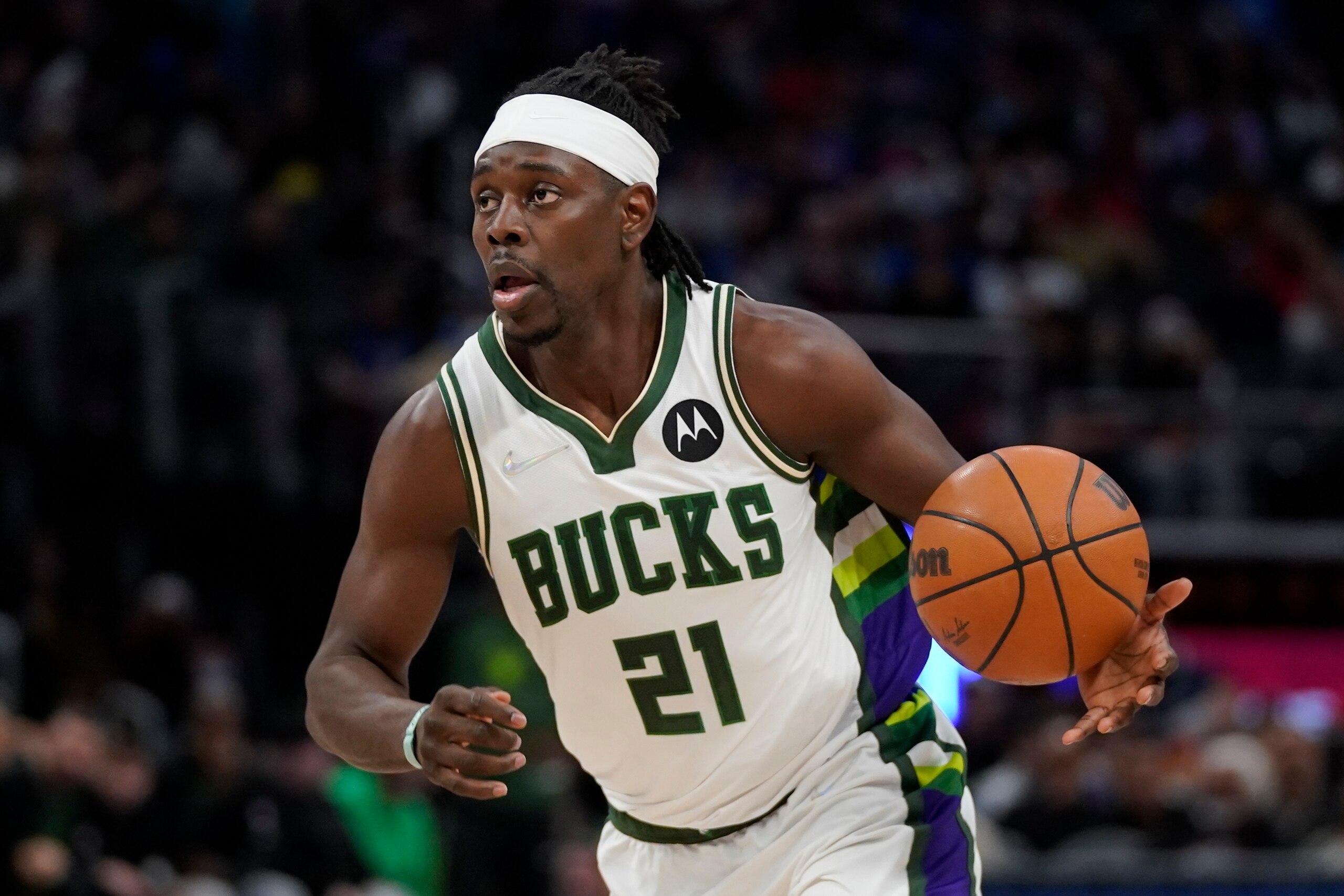 Milwaukee Bucks guard Jrue Holiday (21) plays against the Detroit Pistons in the first half of an NBA basketball game in Detroit, Friday, April 8, 2022. (AP Photo/Paul Sancya) Milwaukee Bucks guard Jrue Holiday (21) plays against the Detroit Pistons in the first half of an NBA basketball game in Detroit, Friday, April 8, 2022. (AP Photo/Paul Sancya)