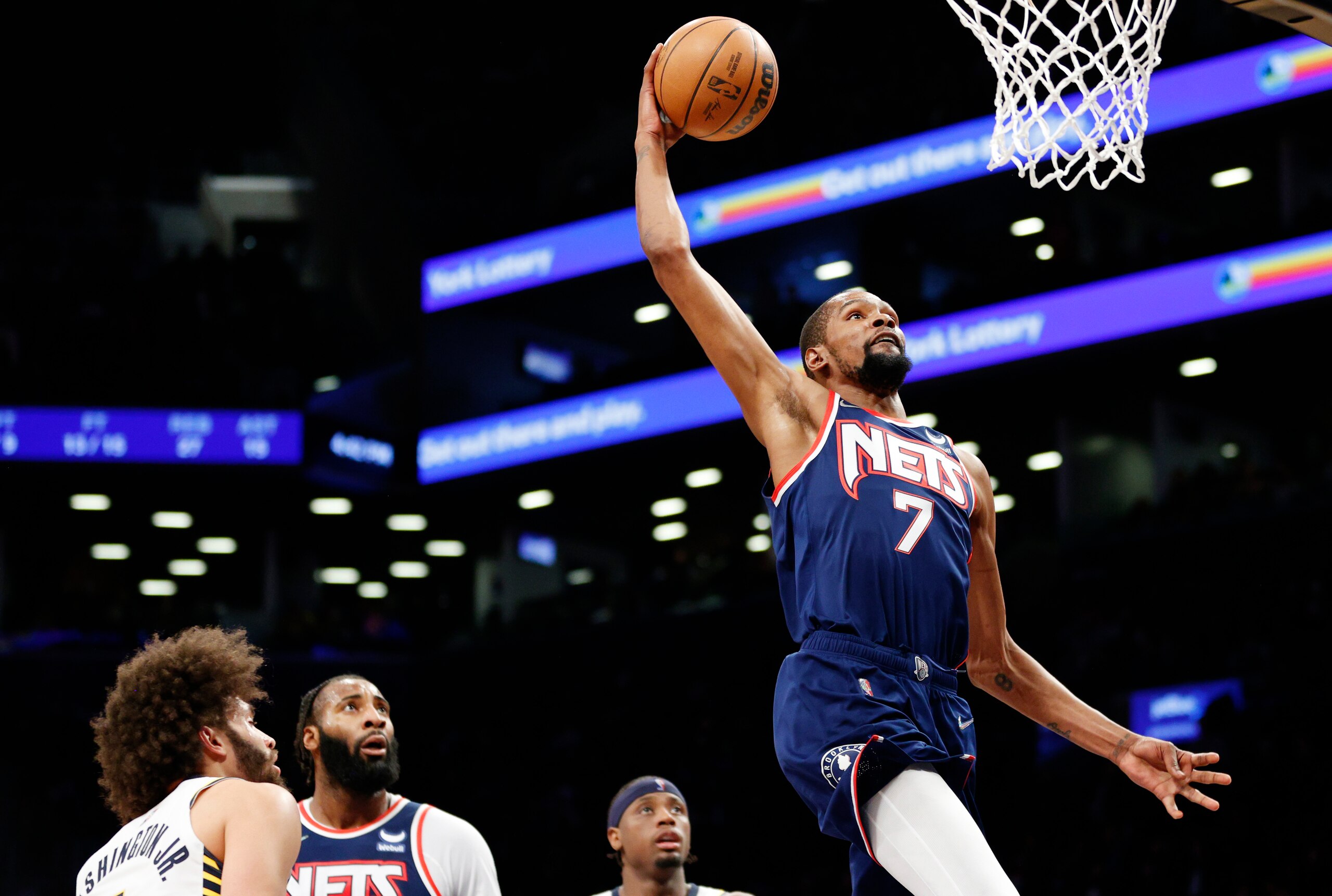 NEW YORK, NEW YORK - APRIL 10: Kevin Durant #7 of the Brooklyn Nets dunks during the first half against the Indiana Pacers at Barclays Center on April 10, 2022 in the Brooklyn borough of New York City. NOTE TO USER: User expressly acknowledges and agrees that, by downloading and or using this photograph, User is consenting to the terms and conditions of the Getty Images License Agreement. (Photo by Sarah Stier/Getty Images)