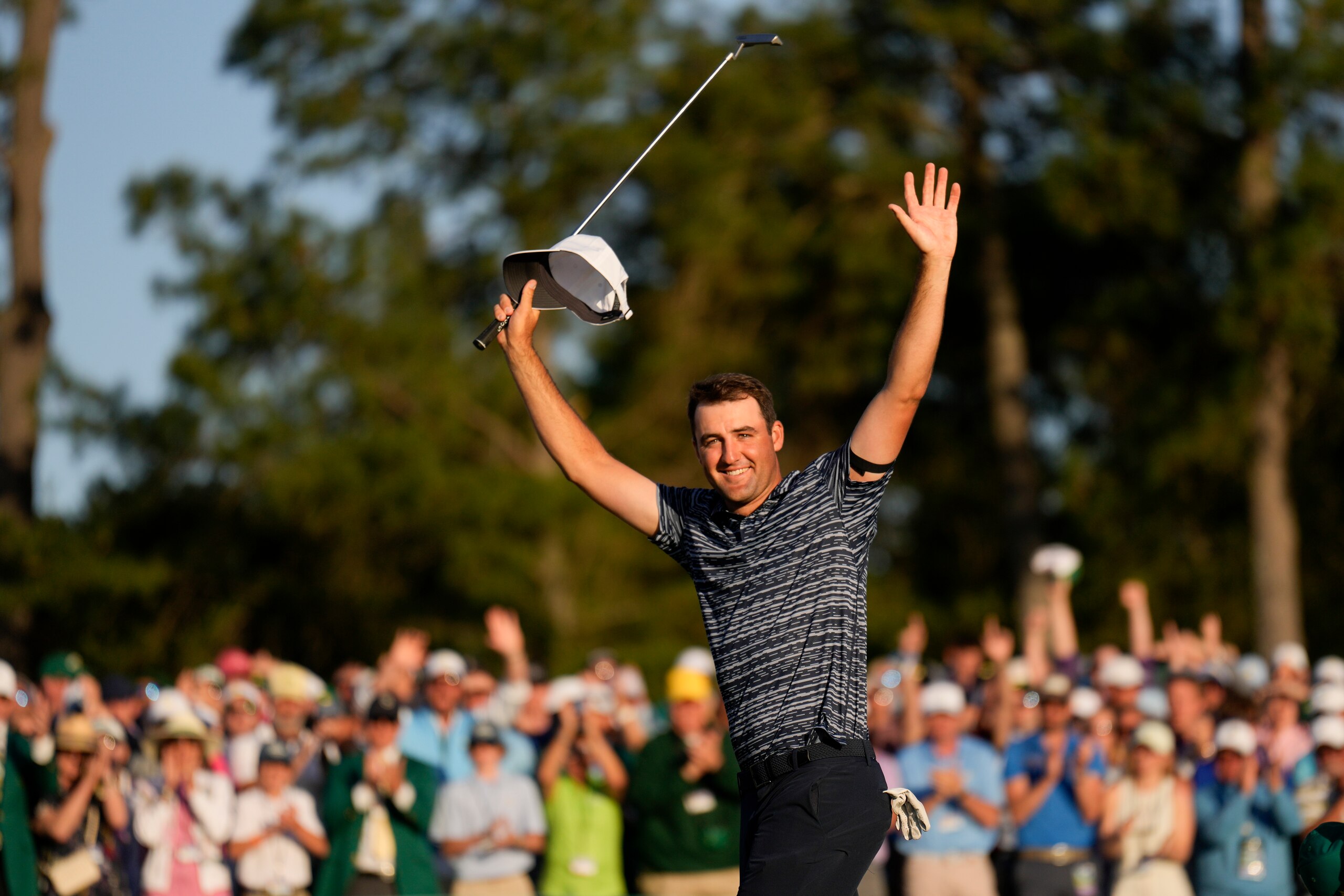 Scottie Scheffler celebrates after winning the 86th Masters golf tournament on Sunday, April 10, 2022, in Augusta, Ga. (AP Photo/Matt Slocum)