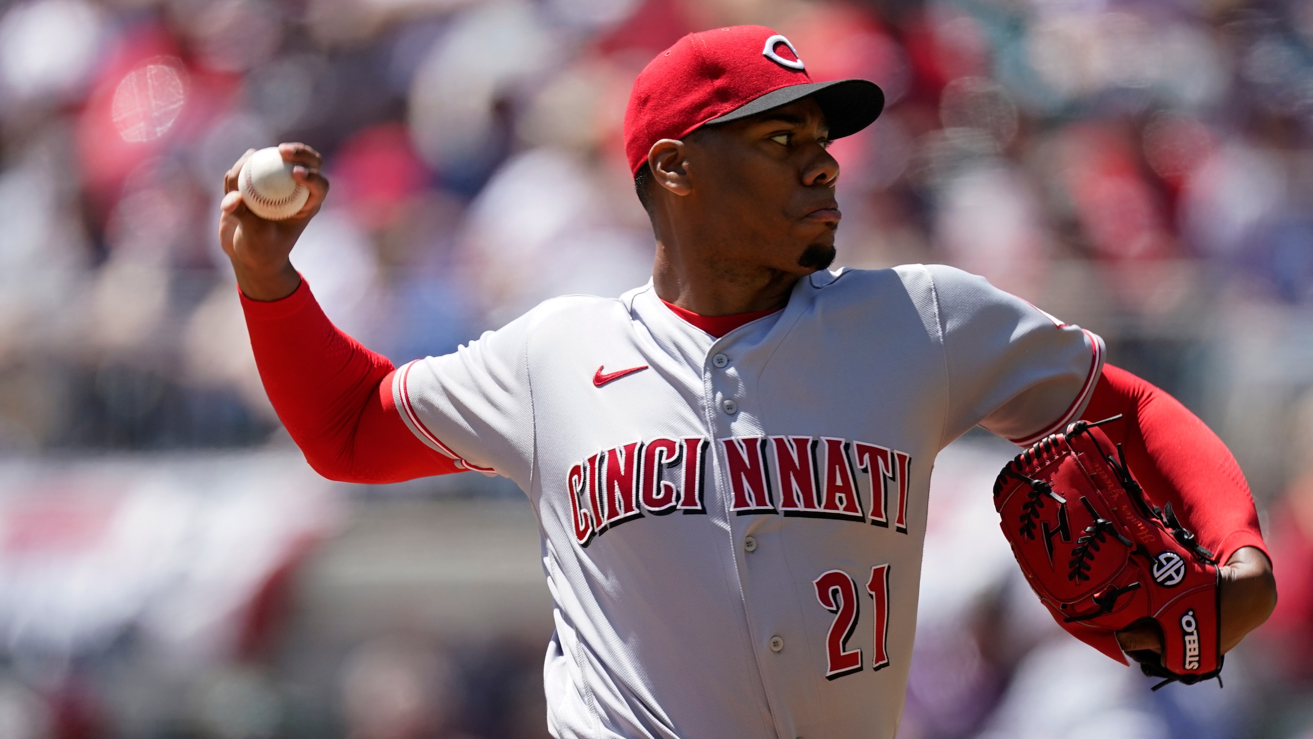 Cincinnati Reds starting pitcher Hunter Greene (21) is shown during a baseball game against the Atlanta Braves Sunday, April 10, 2022, in Atlanta. (AP Photo/John Bazemore)