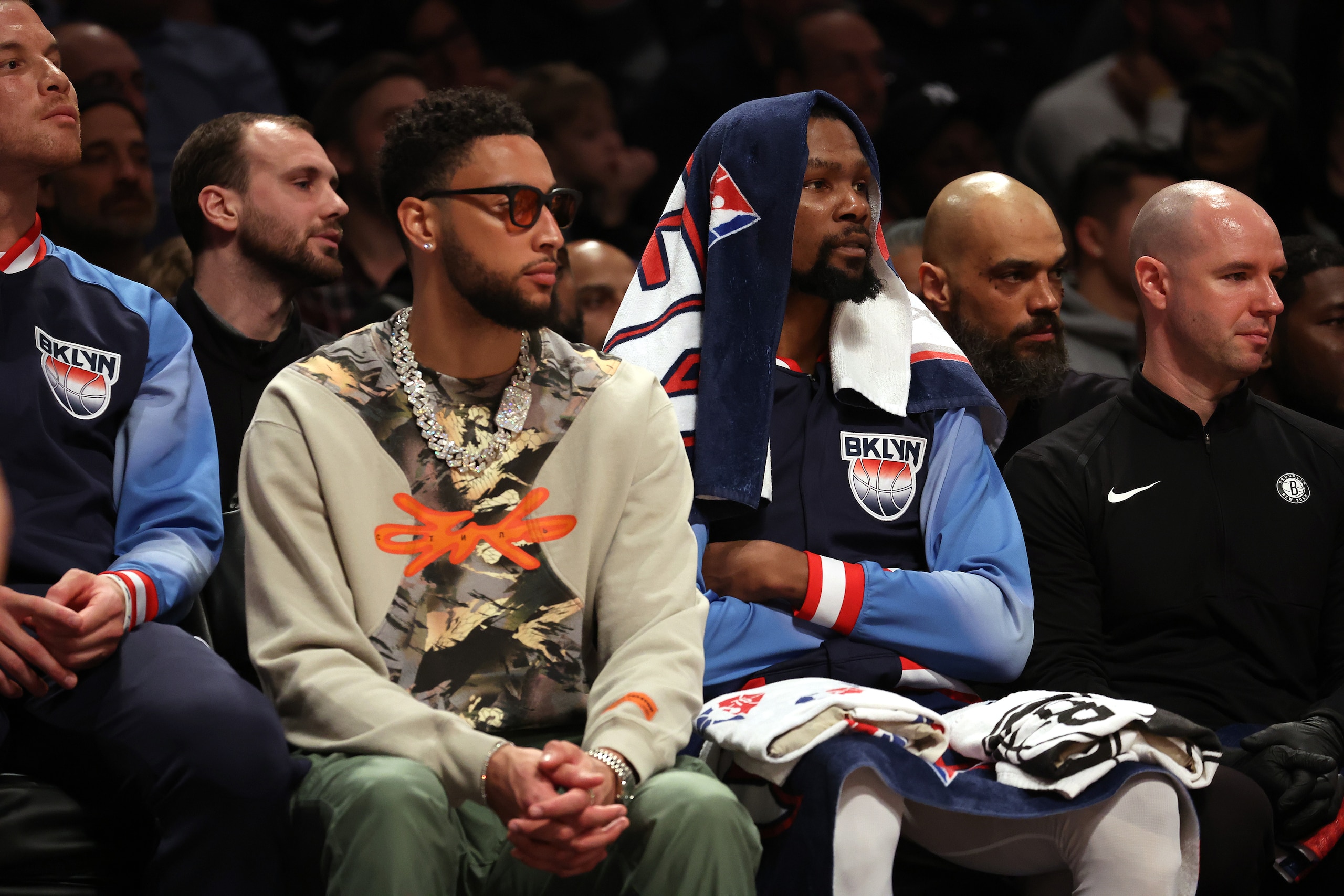 NEW YORK, NEW YORK - MARCH 31:  Ben Simmons and Kevin Durant #7 of the Brooklyn Nets look on during their game against the Milwaukee Bucks at Barclays Center on March 31, 2022 in New York City.  NOTE TO USER: User expressly acknowledges and agrees that, by downloading and or using this photograph, User is consenting to the terms and conditions of the Getty Images License Agreement.   (Photo by Al Bello/Getty Images)