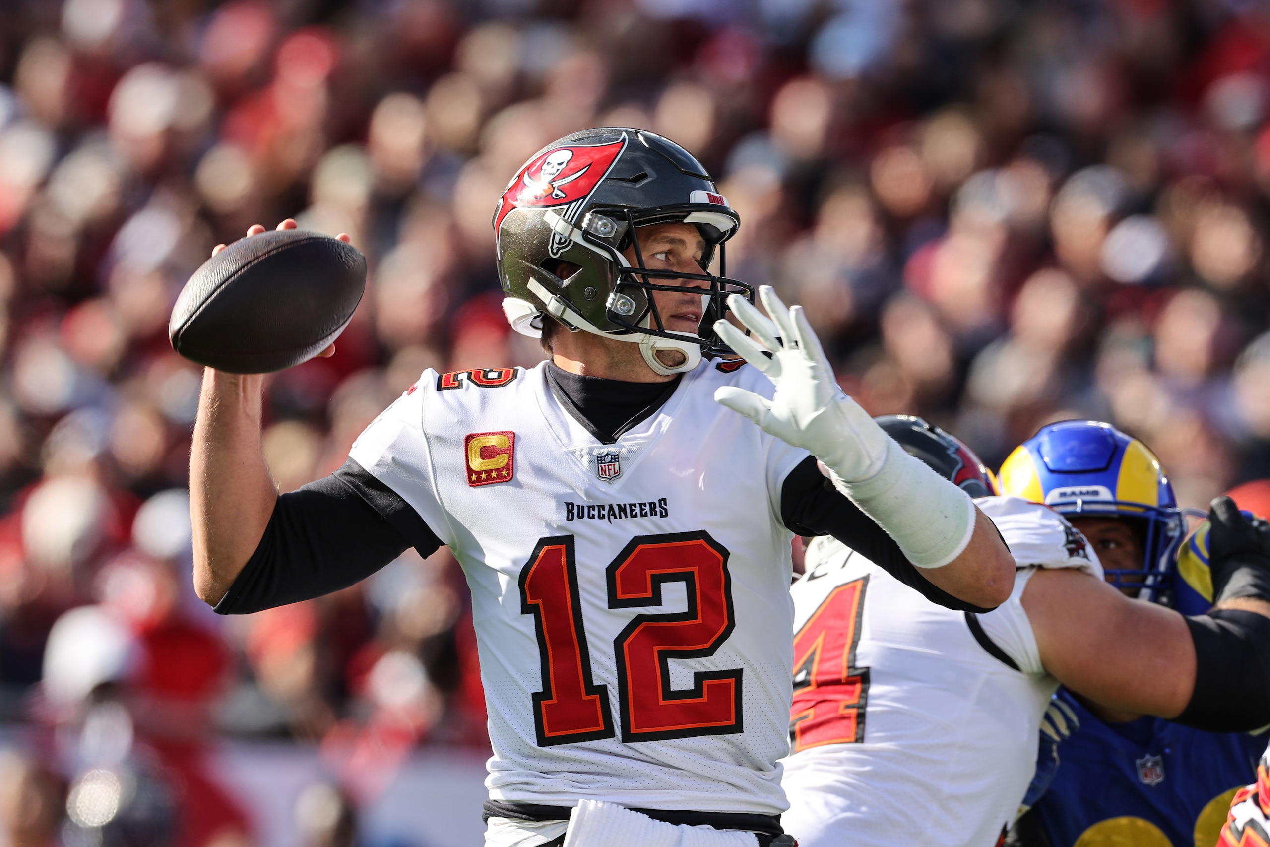 Tampa, Florida, Sunday, January 23, 2022 - Tampa quarterback Tom Brady passes during a first half drive against the Rams in the NFC Divisional Playoff at Raymond James Stadium. (Robert Gauthier/Los Angeles Times via Getty Images) Tampa, Florida, Sunday, January 23, 2022 - Tampa quarterback Tom Brady passes during a first half drive against the Rams in the NFC Divisional Playoff at Raymond James Stadium. (Robert Gauthier/Los Angeles Times via Getty Images)