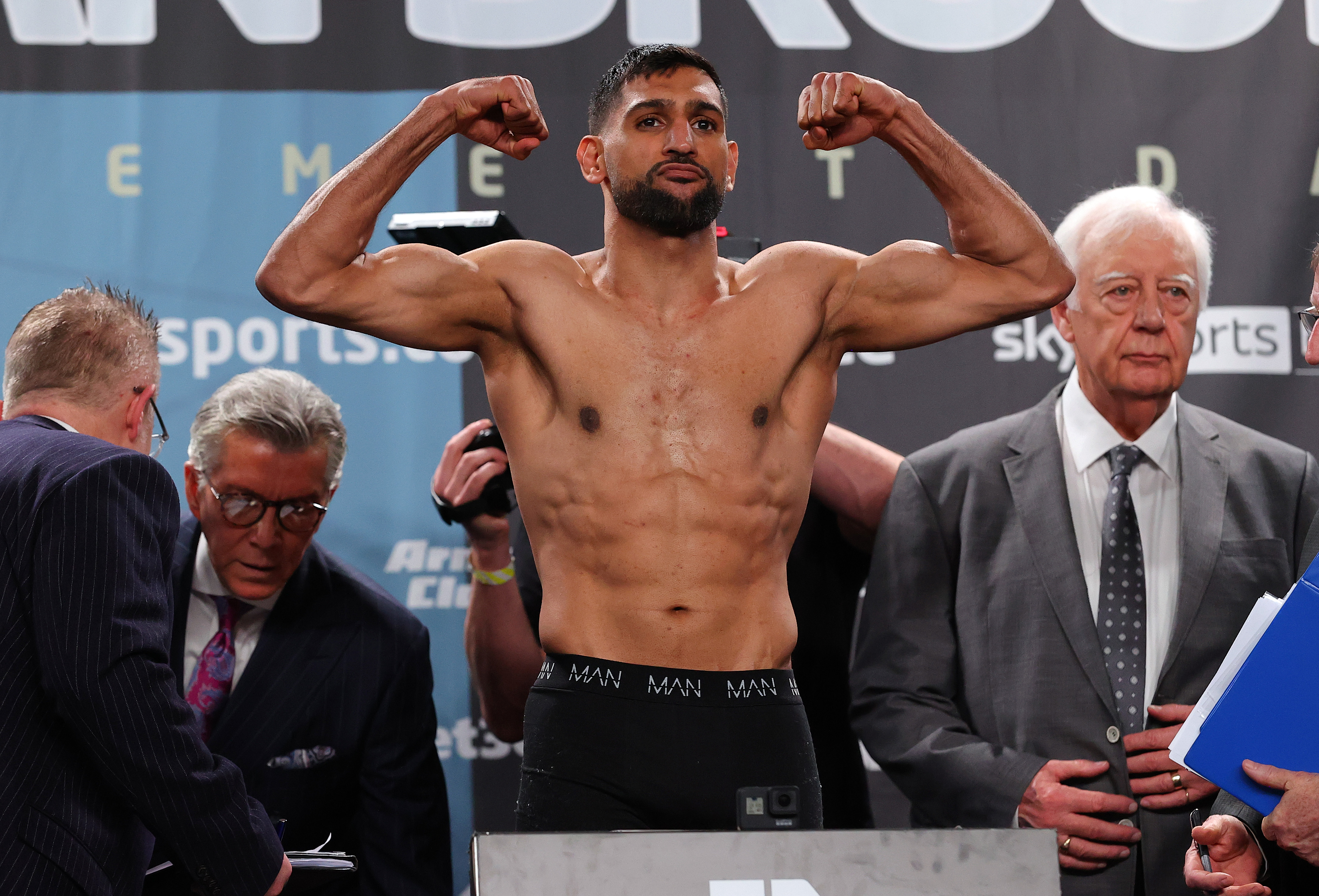 MANCHESTER, ENGLAND - FEBRUARY 18: Amir Khan stands on the scales during the official weigh-in at Manchester Central Convention Complex ahead of his fight against Kell Brook on February 18, 2022 in Manchester, England. (Photo by Alex Livesey/Getty Images)
