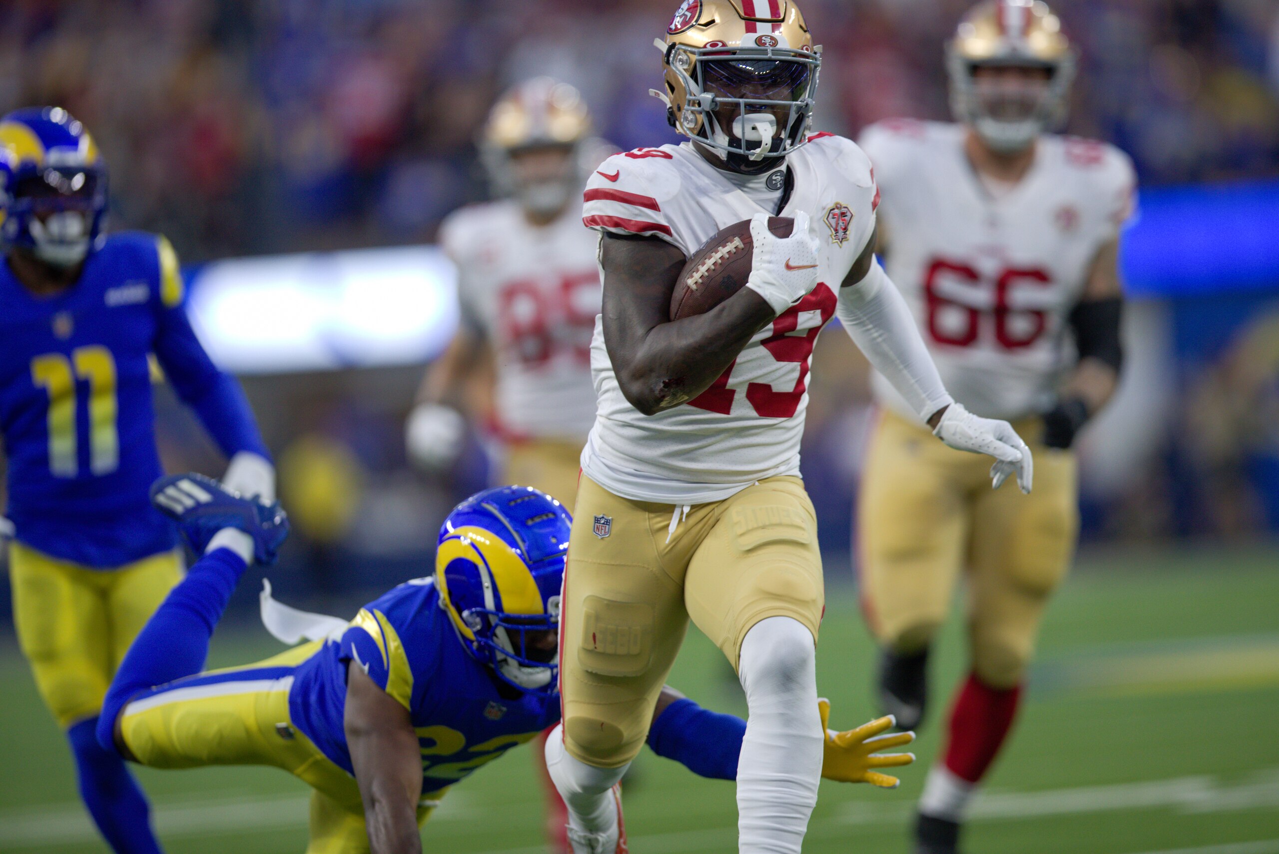 INGLEWOOD, CA - JANUARY 30: Deebo Samuel #19 of the San Francisco 49ers heads to the end zone on a 44-yard touchdown catch during the game against the Los Angeles Rams at SoFi Stadium on January 30, 2022 in Inglewood, California. The Rams defeated the 49ers 20-17. (Photo by Michael Zagaris/San Francisco 49ers/Getty Images) INGLEWOOD, CA - JANUARY 30: Deebo Samuel #19 of the San Francisco 49ers heads to the end zone on a 44-yard touchdown catch during the game against the Los Angeles Rams at SoFi Stadium on January 30, 2022 in Inglewood, California. The Rams defeated the 49ers 20-17. (Photo by Michael Zagaris/San Francisco 49ers/Getty Images)