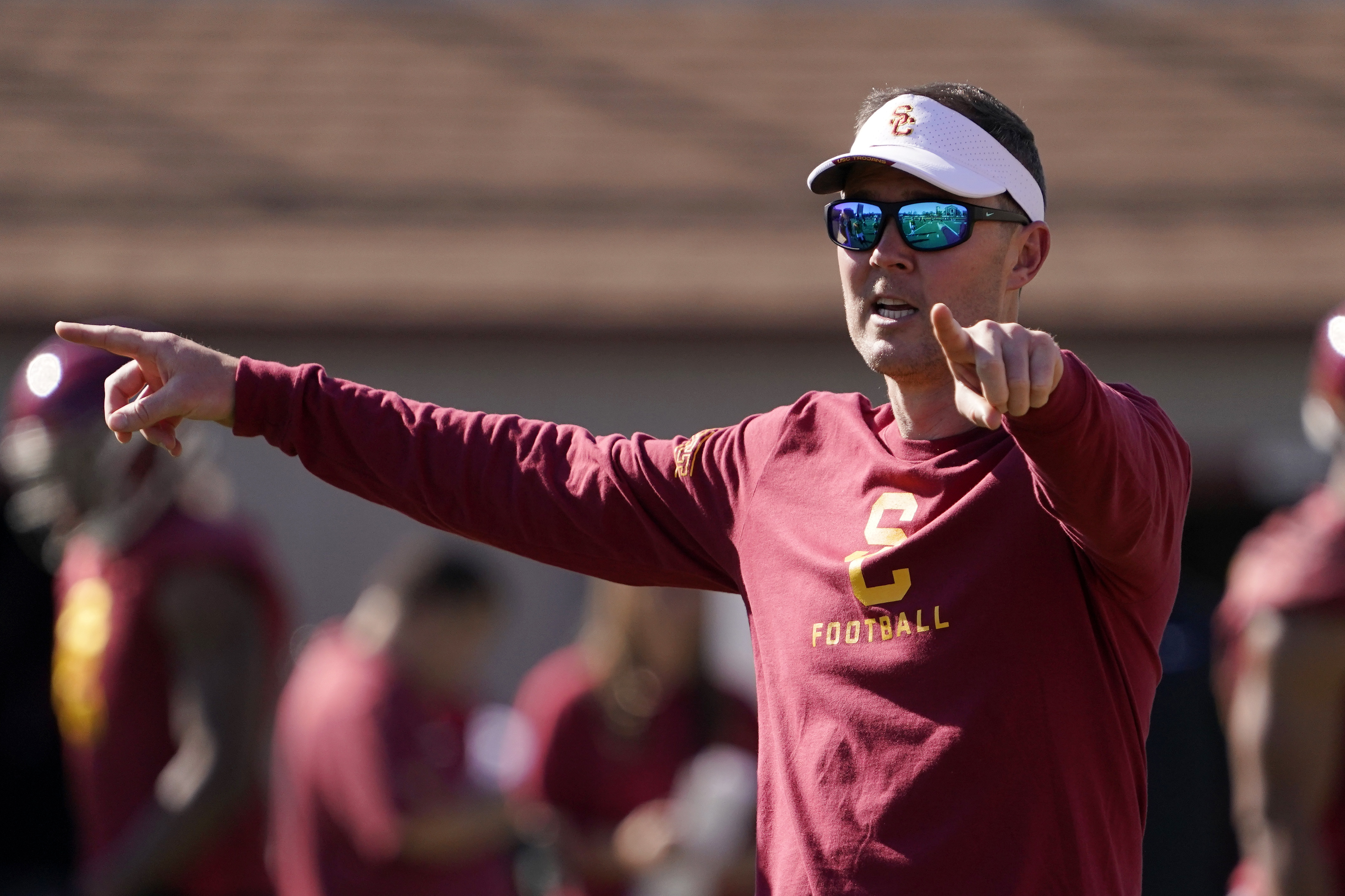 Southern California head coach Lincoln Riley gestures during an NCAA college football practice Thursday, March 24, 2022, in Los Angeles. (AP Photo/Mark J. Terrill)