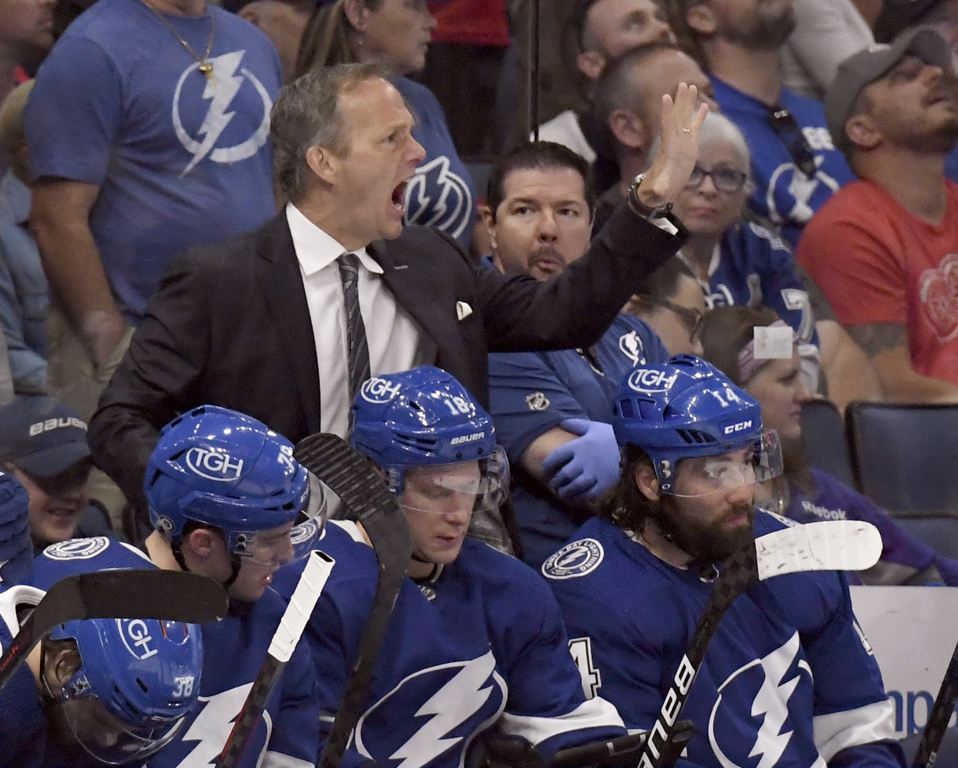 Tampa Bay Lightning head coach Jon Cooper instructs his team during the third period an NHL hockey game against the Detroit Red Wings Tuesday, April 19, 2022, in Tampa, Fla. (AP Photo/Jason Behnken)