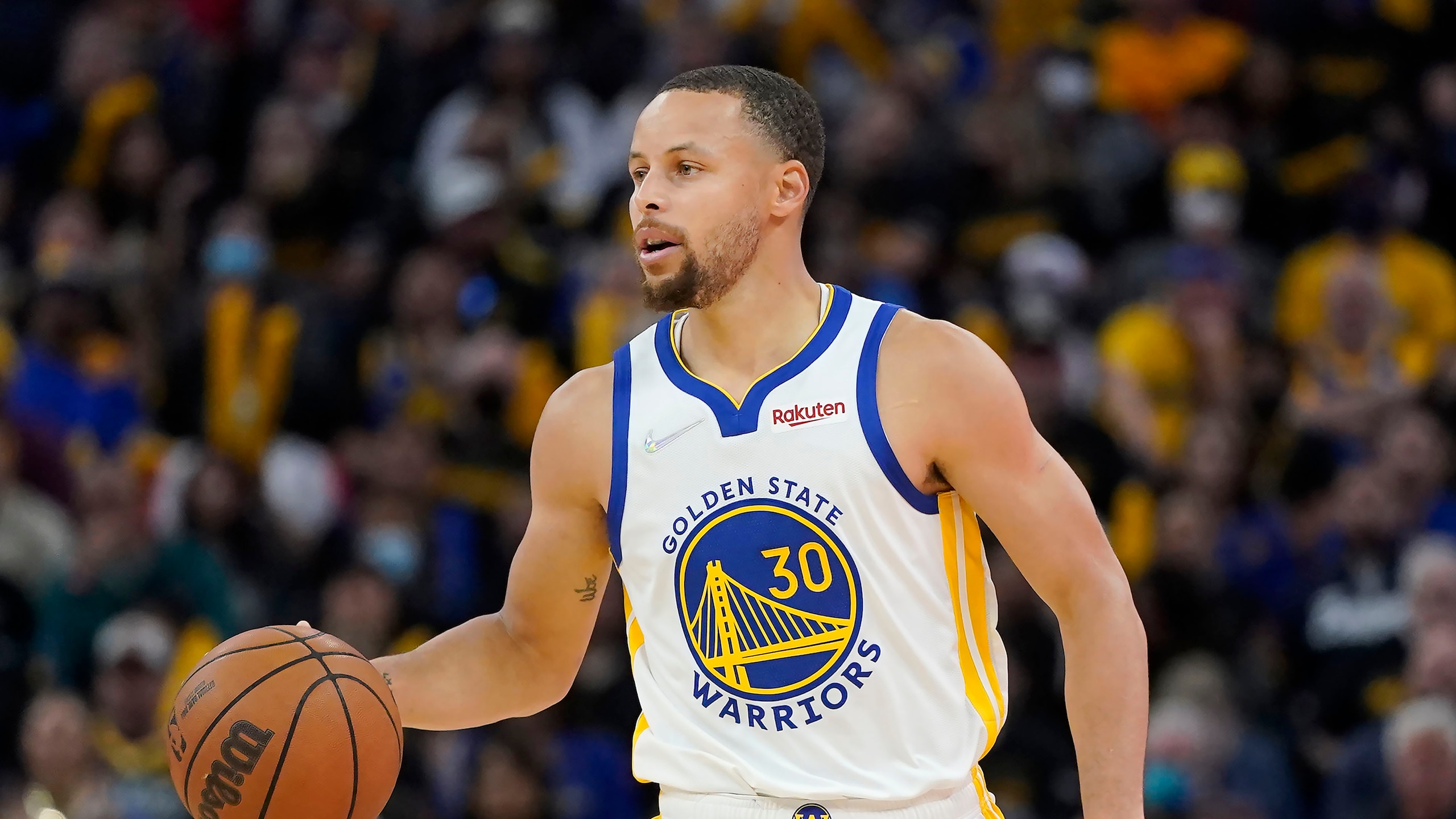 Golden State Warriors guard Stephen Curry against the Denver Nuggets during Game 2 of an NBA basketball first-round playoff series in San Francisco, Monday, April 18, 2022. (AP Photo/Jeff Chiu)