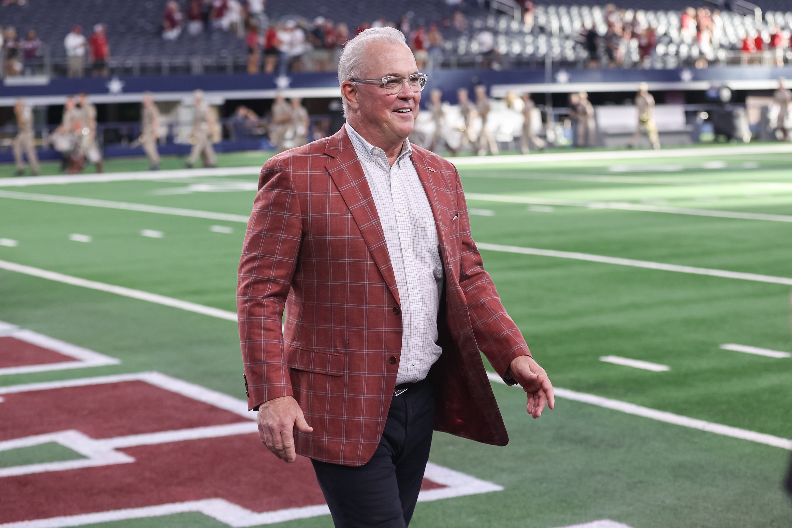 ARLINGTON, TX - SEPTEMBER 25: Stephen Jones walks on the field during the  Southwest Classic college football game between the Texas A&M Aggies and Arkansas Razorbacks on September 25, 2021 at AT&T Stadium in Arlington, TX.  (Photo by Matthew Visinsky/Icon Sportswire via Getty Images)