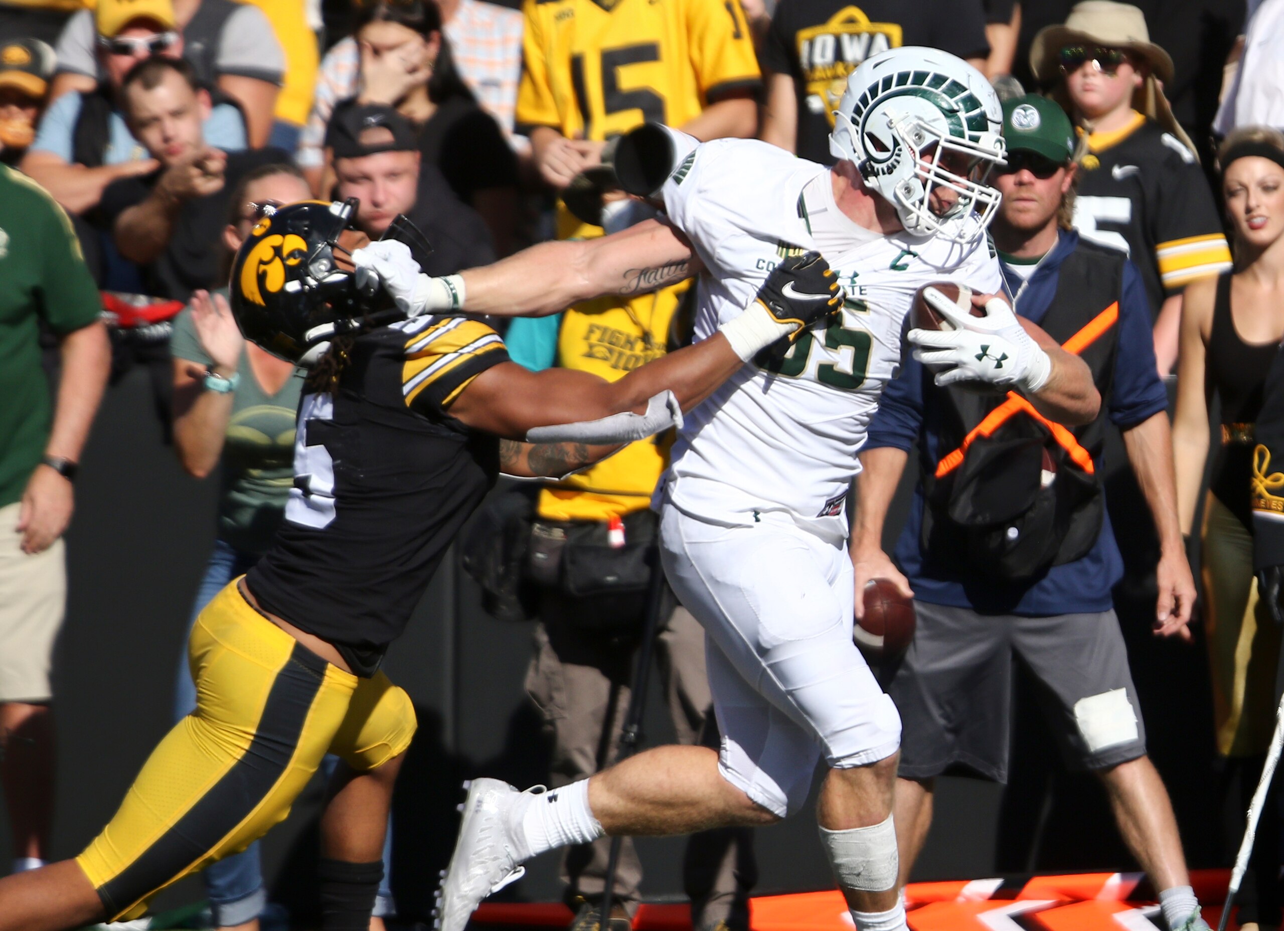 IOWA CITY, IOWA- SEPTEMBER 25: Tight end Trey McBride #85 of the Colorado State Rams fights off a tackle during the first half by linebacker Jestin Jacobs #5 of the Iowa Hawkeyes at Kinnick Stadium on September 25, 2021 in Iowa City, Iowa. (Photo by Matthew Holst/Getty Images) IOWA CITY, IOWA- SEPTEMBER 25: Tight end Trey McBride #85 of the Colorado State Rams fights off a tackle during the first half by linebacker Jestin Jacobs #5 of the Iowa Hawkeyes at Kinnick Stadium on September 25, 2021 in Iowa City, Iowa. (Photo by Matthew Holst/Getty Images)