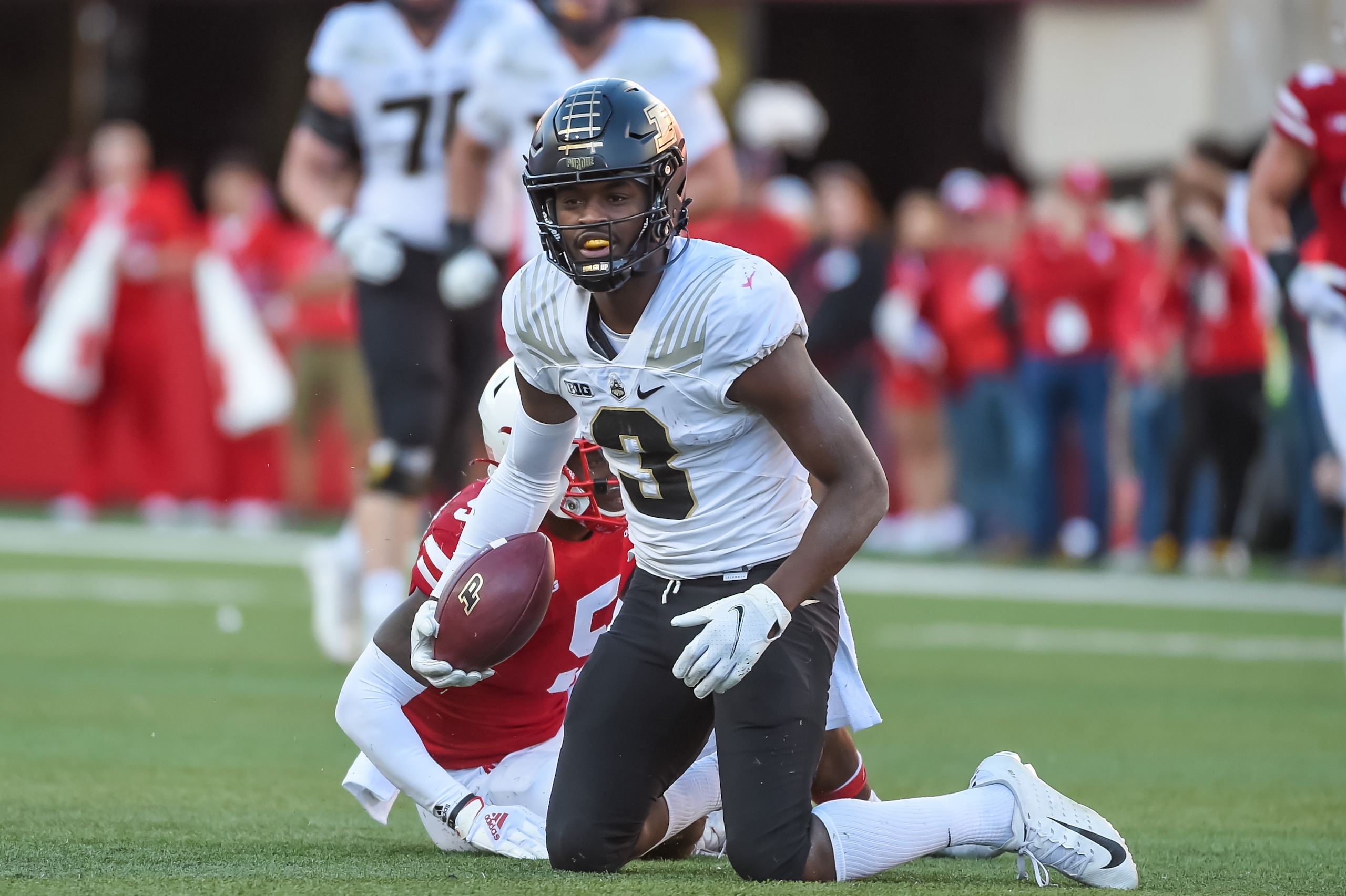 LINCOLN, NE - OCTOBER 30: Wide receiver David Bell #3 of the Purdue Boilermakers reacts after catching a pass against cornerback Cam Taylor-Britt #5 of the Nebraska Cornhuskers in the second half at Memorial Stadium on October 30, 2021 in Lincoln, Nebraska. (Photo by Steven Branscombe/Getty Images)