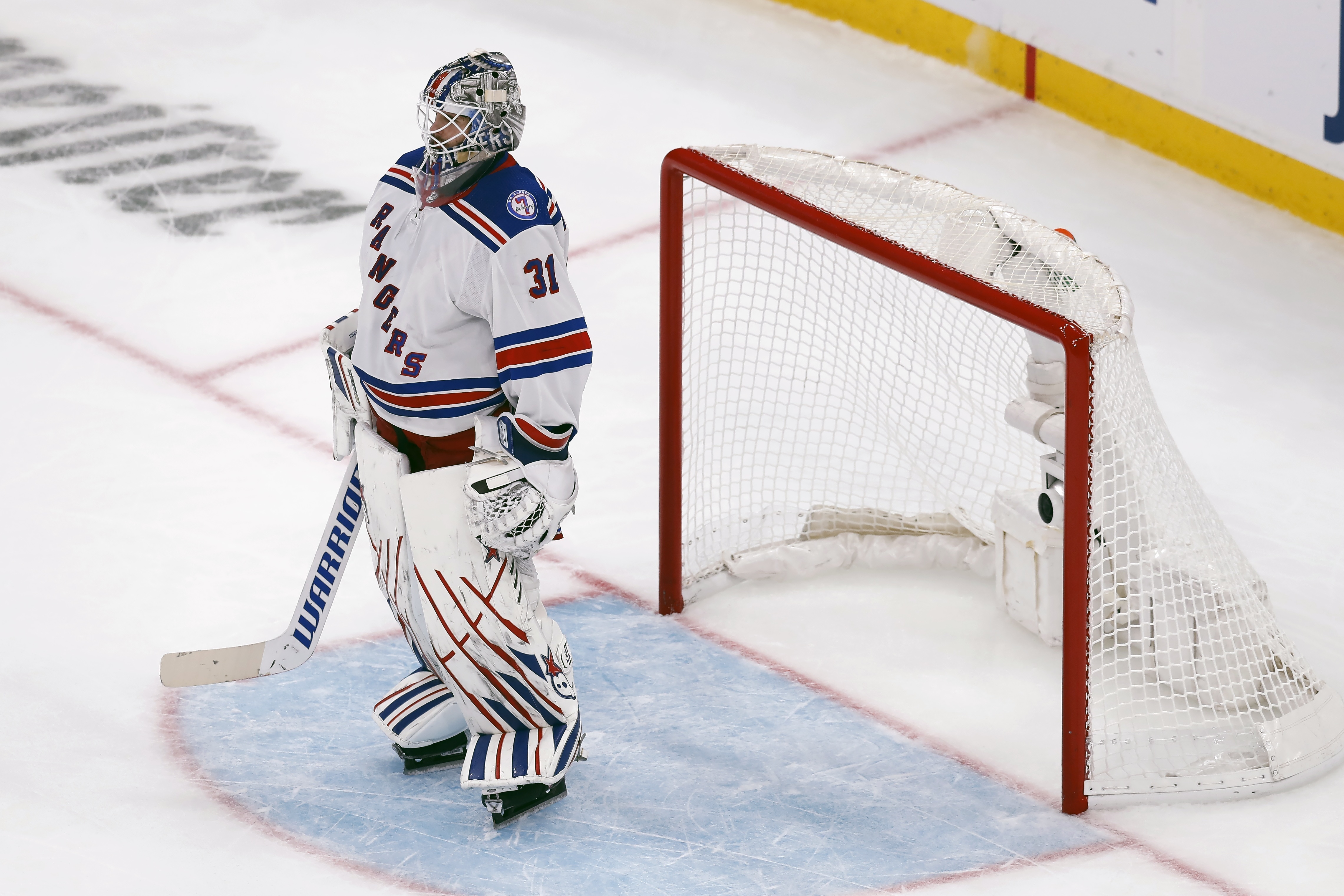 New York Rangers' Igor Shesterkin stands in front of the gaol as time runs out during the third period of an NHL hockey game against the Boston Bruins, Saturday, April 23, 2022, in Boston. (AP Photo/Michael Dwyer)