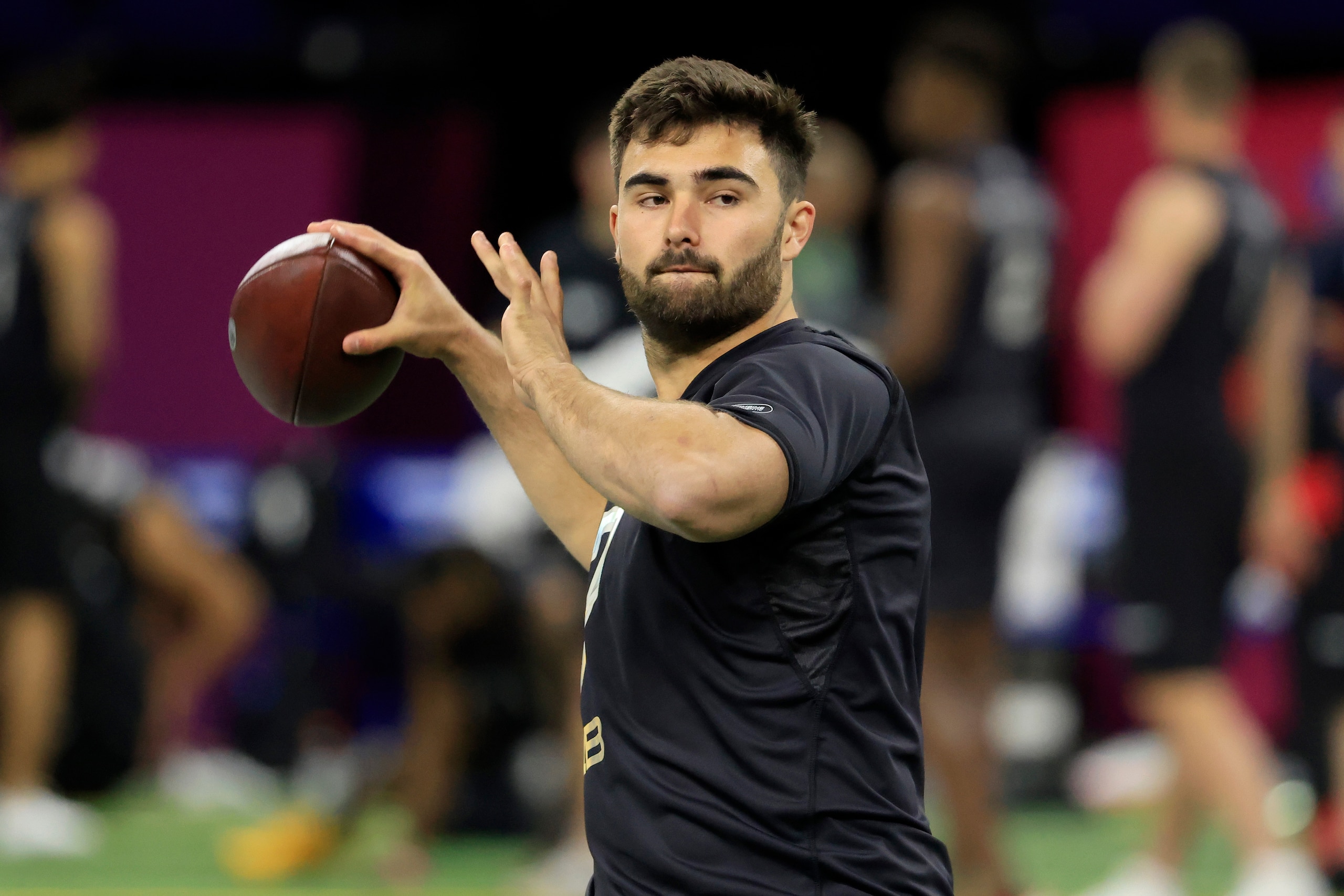 INDIANAPOLIS, INDIANA - MARCH 03: Sam Howell #QB07 of the North Carolina throws during the NFL Combine at Lucas Oil Stadium on March 03, 2022 in Indianapolis, Indiana. (Photo by Justin Casterline/Getty Images)