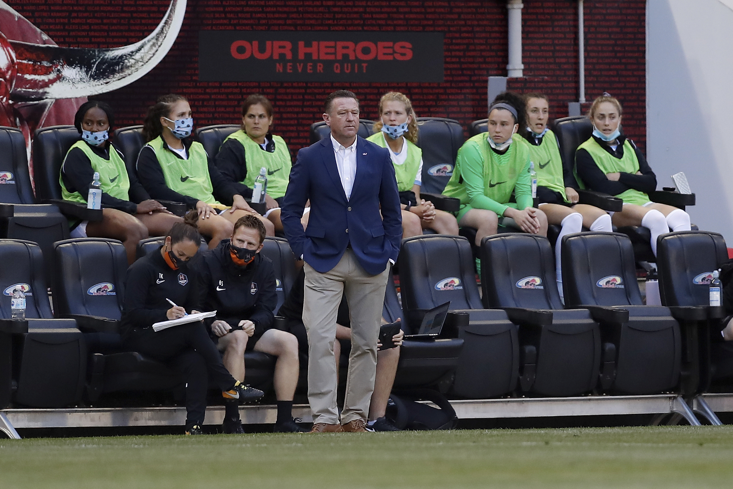 Houston Dash head coach James Clarkson watches from the sideline during the first half of an NWSL soccer match against Gotham FC, Saturday, May 15, 2021, in Harrison, N.J. Gotham FC won 1-0. (AP Photo/Steve Luciano)