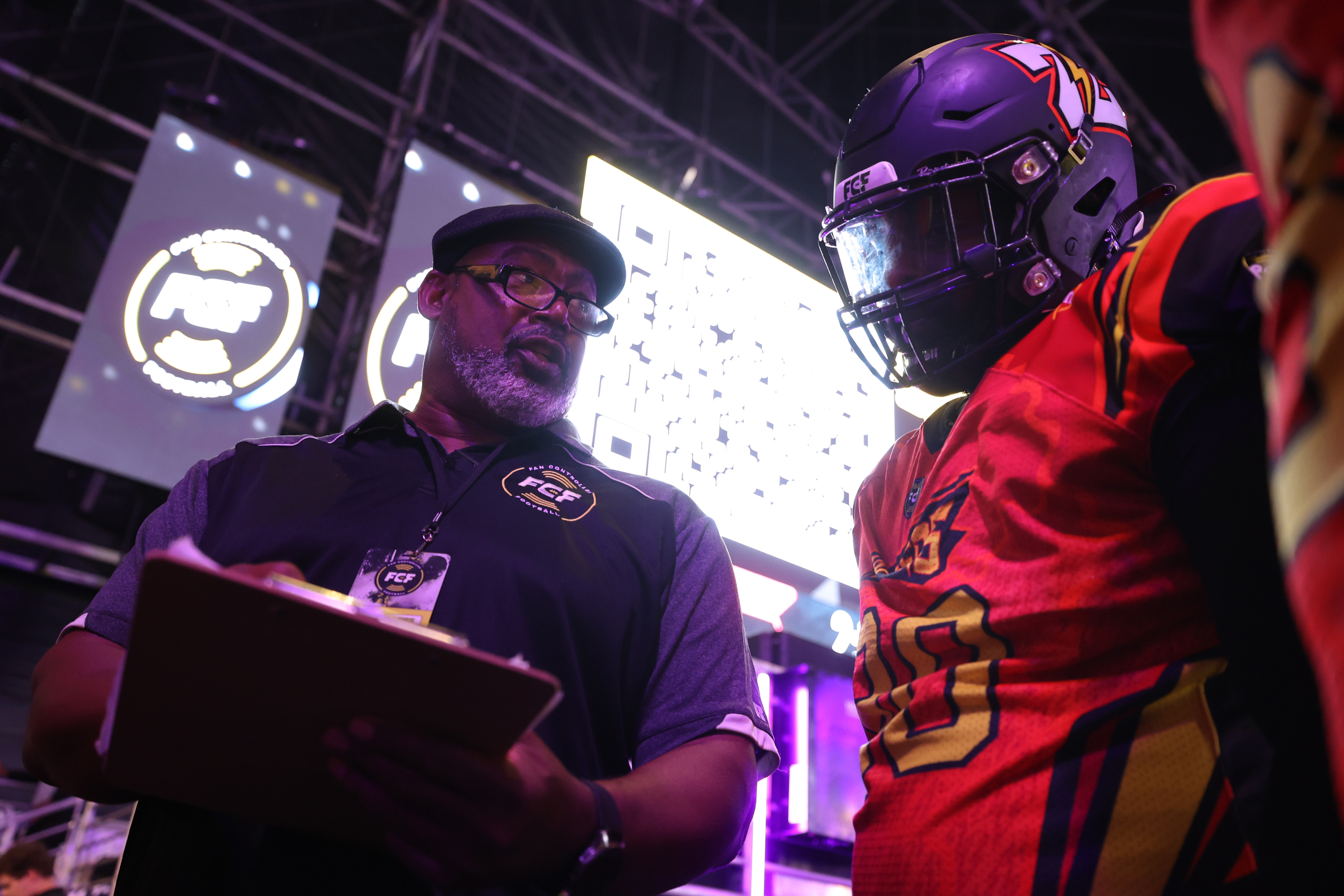 ATLANTA, GEORGIA - APRIL 16: Staff member Todd Howard instructs a member of the Zappers prior to the Fan Controlled Football League game against the Shoulda Been Stars on April 16, 2022 in Atlanta, Georgia. (Photo by Casey Sykes/Fan Controlled Football/Getty Images)
