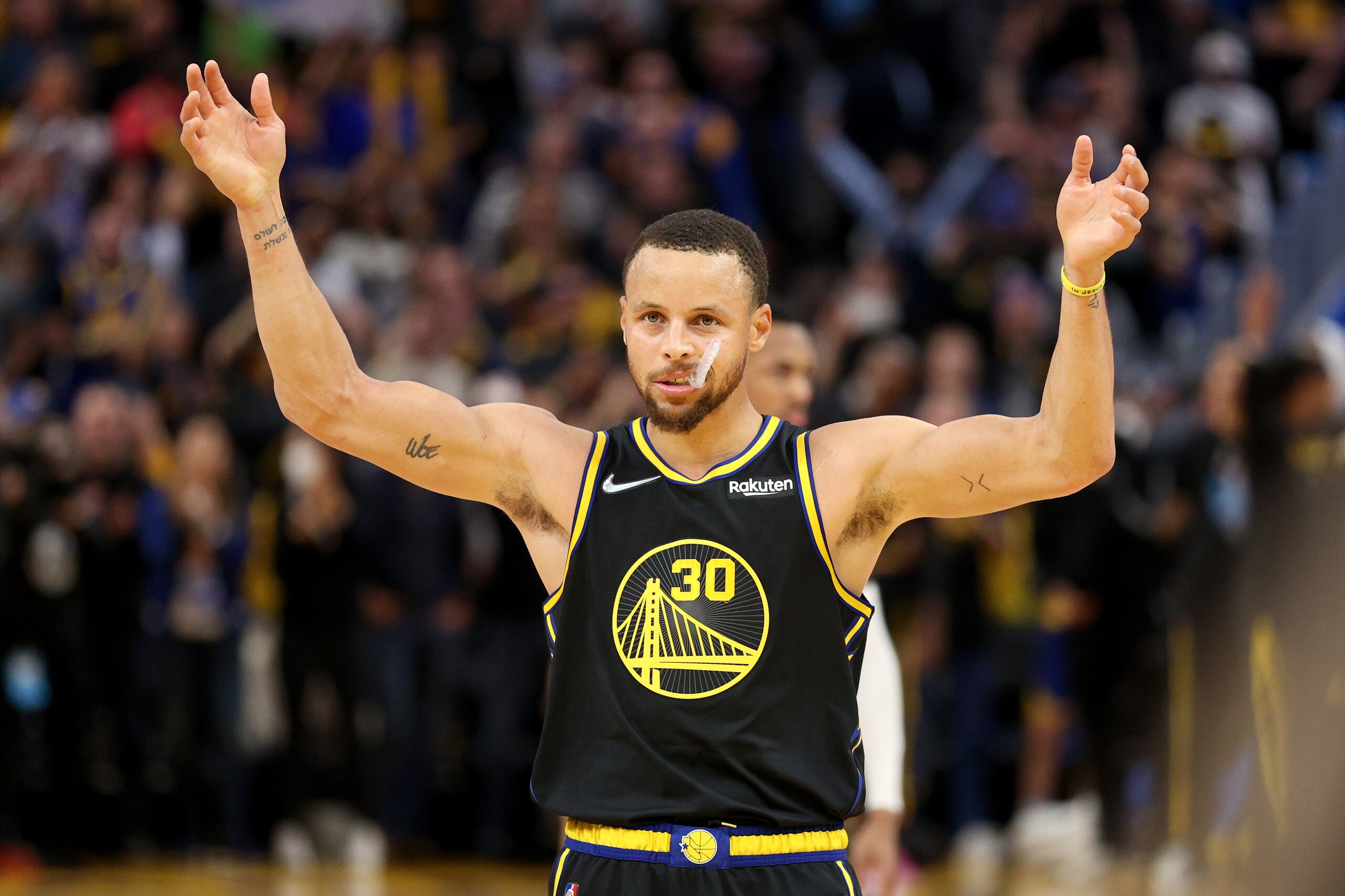 SAN FRANCISCO, CALIFORNIA - APRIL 27:  Stephen Curry #30 of the Golden State Warriors reacts in the finals seconds of their victory over the Denver Nuggets in Game Five of the Western Conference First Round NBA Playoffs at Chase Center on April 27, 2022 in San Francisco, California. NOTE TO USER: User expressly acknowledges and agrees that, by downloading and/or using this photograph, User is consenting to the terms and conditions of the Getty Images License Agreement.  (Photo by Ezra Shaw/Getty Images)