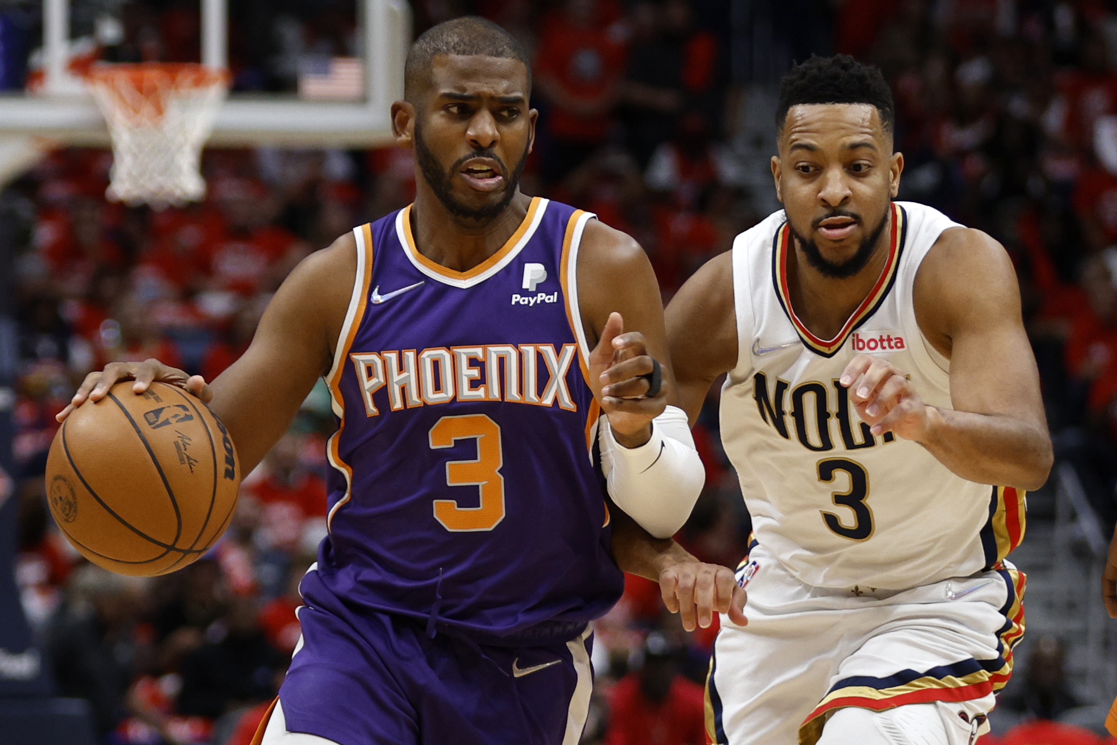 NEW ORLEANS, LOUISIANA - APRIL 28:  Chris Paul #3 of the Phoenix Suns drives the ball up the court against the New Orleans Pelicans at Smoothie King Center on April 28, 2022 in New Orleans, Louisiana.  NOTE TO USER: User expressly acknowledges and agrees that, by downloading and or using this Photograph, user is consenting to the terms and conditions of the Getty Images License Agreement.  (Photo by Chris Graythen/Getty Images)