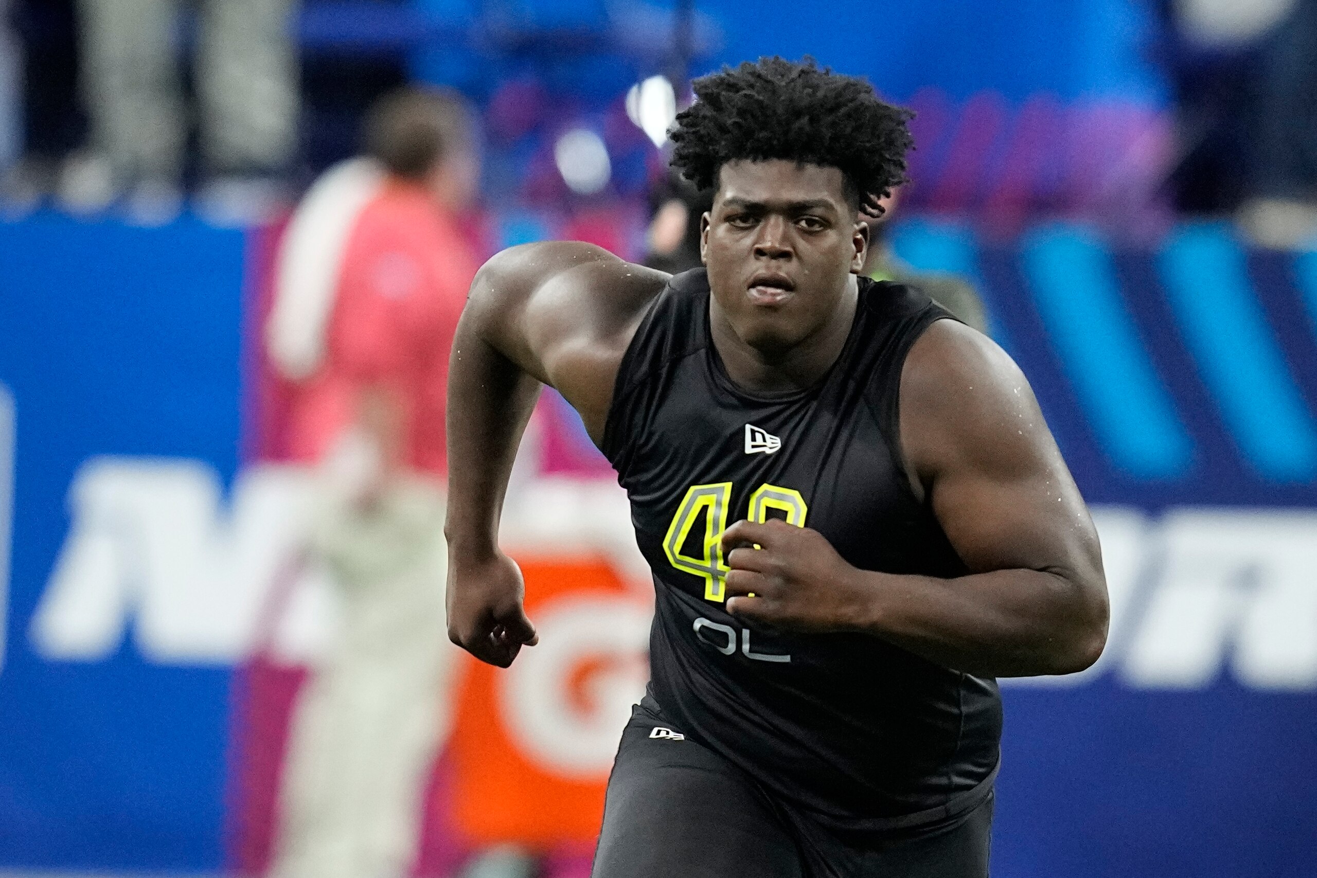 Tulsa offensive lineman Tyler Smith runs a drill during the NFL football scouting combine, Friday, March 4, 2022, in Indianapolis. (AP Photo/Darron Cummings)