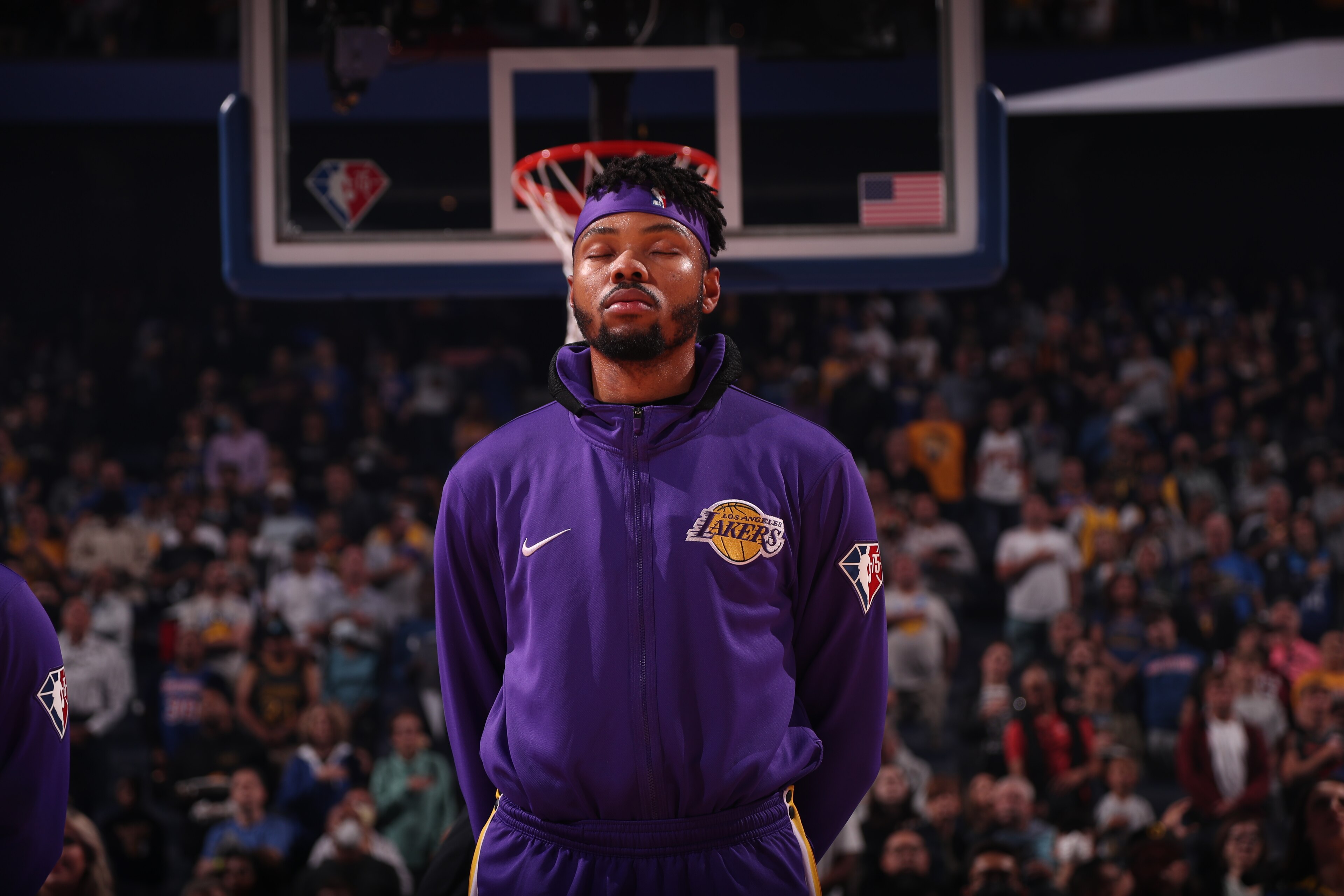 SAN FRANCISCO, CA - APRIL 7: Kent Bazemore #9 of the Los Angeles Lakers stands for the National Anthem before the game against the Golden State Warriors on April 7, 2022 at Chase Center in San Francisco, California. NOTE TO USER: User expressly acknowledges and agrees that, by downloading and or using this photograph, user is consenting to the terms and conditions of Getty Images License Agreement. Mandatory Copyright Notice: Copyright 2022 NBAE (Photo by Jed Jacobsohn/NBAE via Getty Images) SAN FRANCISCO, CA - APRIL 7: Kent Bazemore #9 of the Los Angeles Lakers stands for the National Anthem before the game against the Golden State Warriors on April 7, 2022 at Chase Center in San Francisco, California. NOTE TO USER: User expressly acknowledges and agrees that, by downloading and or using this photograph, user is consenting to the terms and conditions of Getty Images License Agreement. Mandatory Copyright Notice: Copyright 2022 NBAE (Photo by Jed Jacobsohn/NBAE via Getty Images)