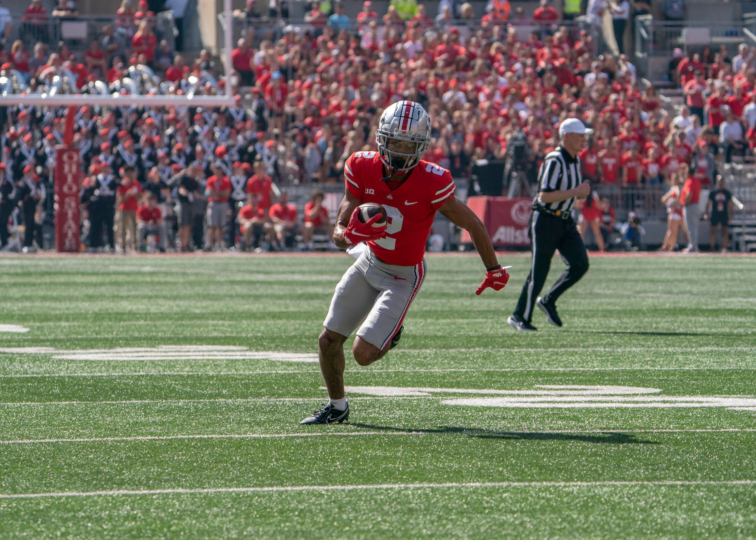 COLUMBUS, OH - OCTOBER 09: Ohio State Buckeyes wide receiver Chris Olave #2 runs with the ball after a catch during the game between the Ohio State Buckeyes and the Maryland Terrapins at Ohio Stadium in Columbus, Ohio on October 9, 2021.(Photo by Jason Mowry/Icon Sportswire via Getty Images)