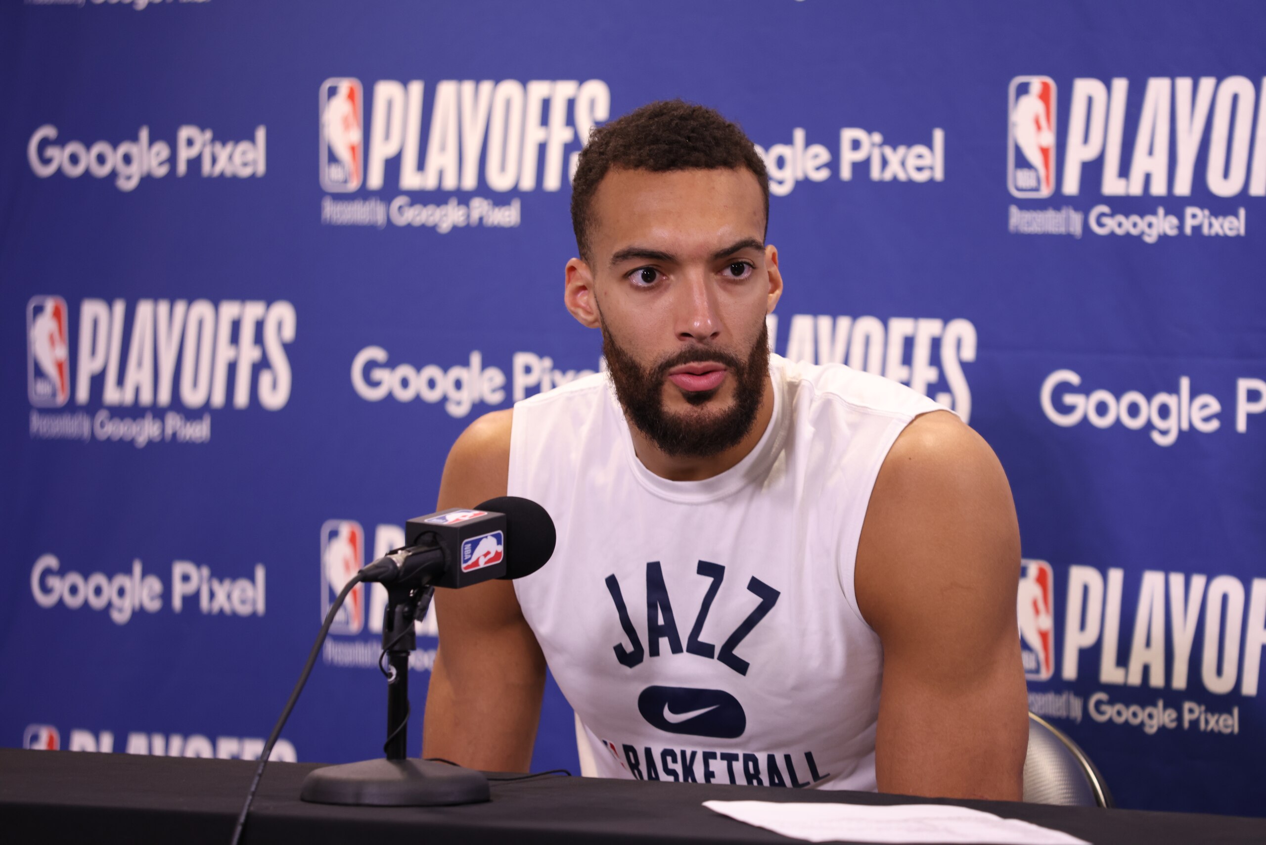 SALT LAKE CITY, UT - APRIL 23: Rudy Gobert #27 of the Utah Jazz talks to the media after Round 1 Game 4 of the 2022 NBA Playoffs against the Dallas Mavericks on April 23, 2022 at vivint.SmartHome Arena in Salt Lake City, Utah. NOTE TO USER: User expressly acknowledges and agrees that, by downloading and or using this Photograph, User is consenting to the terms and conditions of the Getty Images License Agreement. Mandatory Copyright Notice: Copyright 2022 NBAE (Photo by Melissa Majchrzak/NBAE via Getty Images)