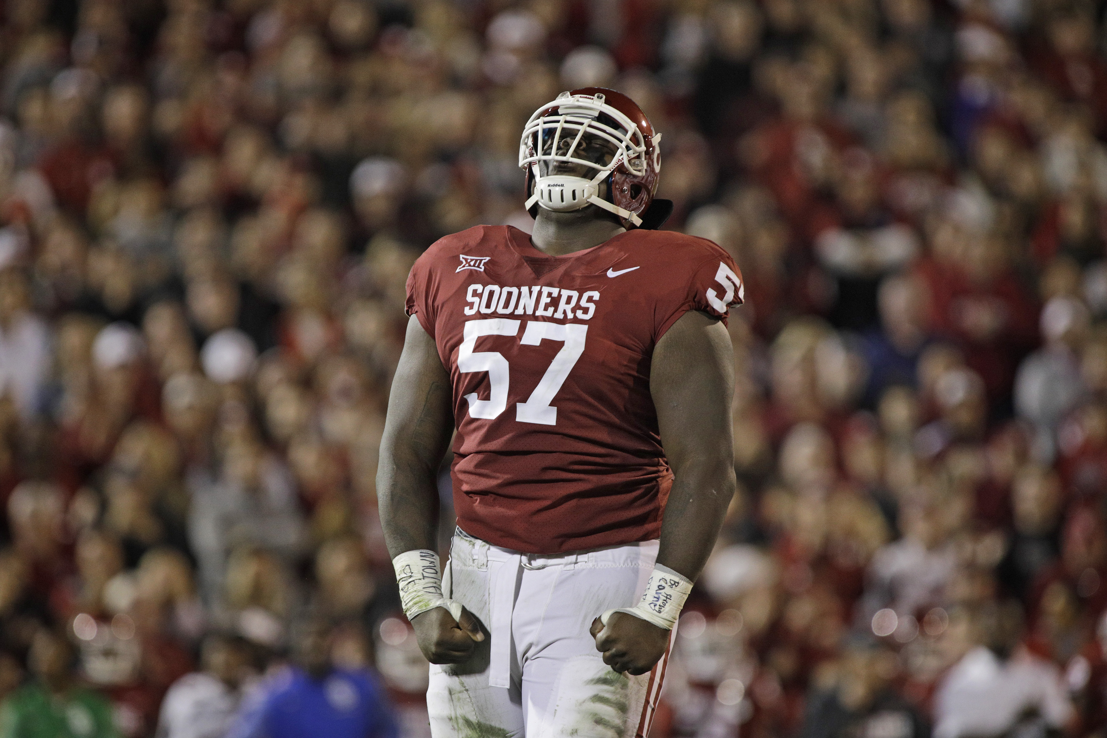 NORMAN, OK - NOVEMBER 11: Defensive tackle Du'Vonta Lampkin #57 of the Oklahoma Sooners celebrates a defensive stop against the TCU Horned Frogs at Gaylord Family Oklahoma Memorial Stadium on November 11, 2017 in Norman, Oklahoma. Oklahoma defeated TCU 38-20. (Photo by Brett Deering/Getty Images)
