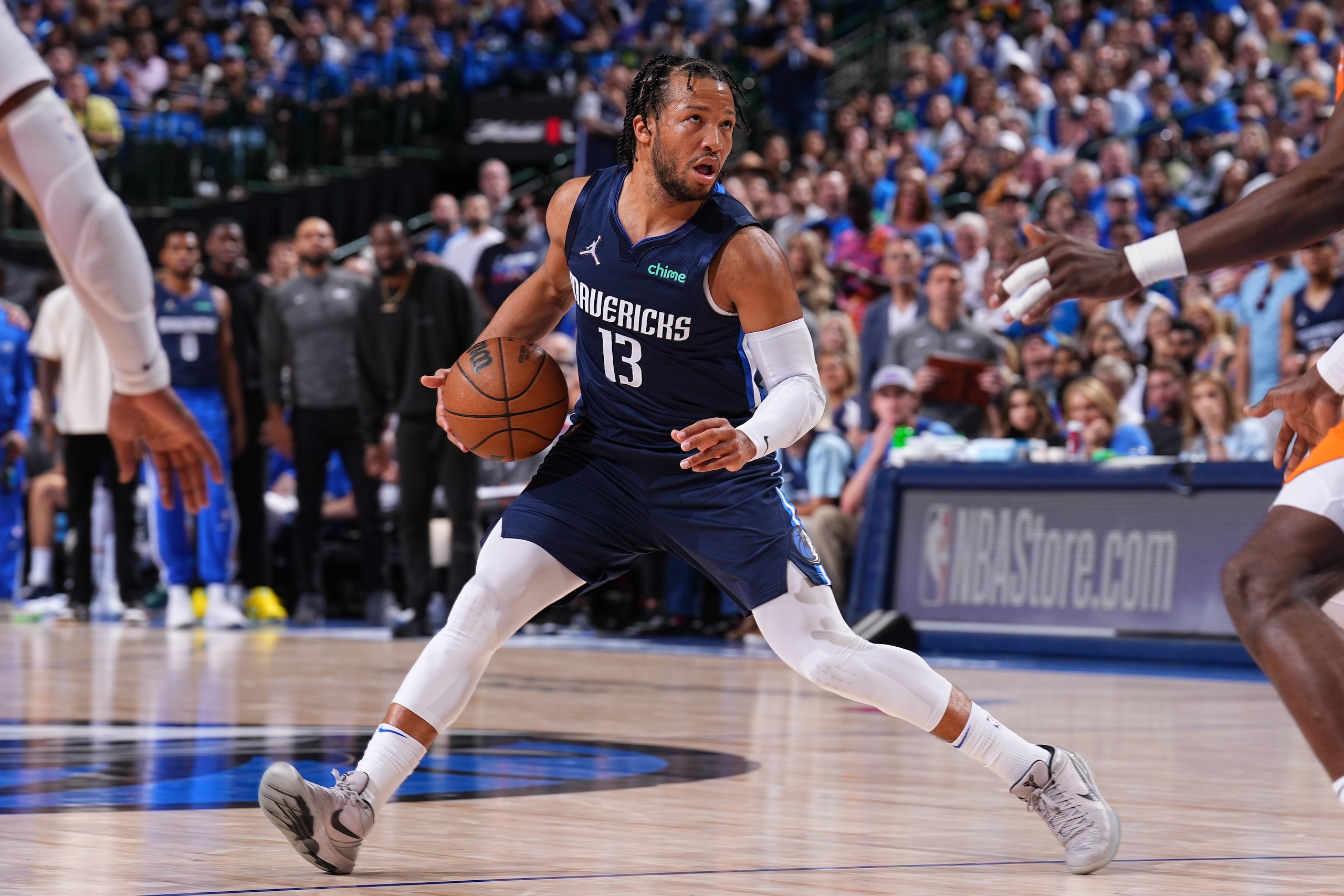 DALLAS, TX - MAY 8: Jalen Brunson #13 of the Dallas Mavericks dribbles the ball against the Phoenix Suns during Game 4 of the 2022 NBA Playoffs Western Conference Semifinals on May 8, 2022 at the American Airlines Center in Dallas, Texas. NOTE TO USER: User expressly acknowledges and agrees that, by downloading and or using this photograph, User is consenting to the terms and conditions of the Getty Images License Agreement. Mandatory Copyright Notice: Copyright 2022 NBAE (Photo by Garrett Ellwood/NBAE via Getty Images)