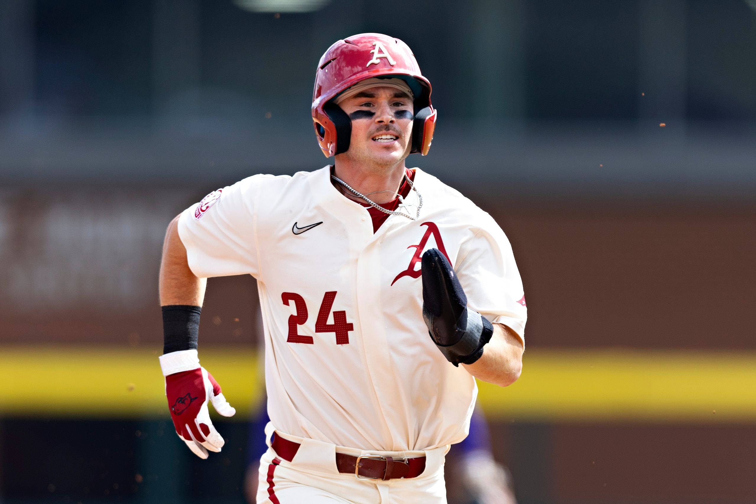 FAYETTEVILLE, ARKANSAS - APRIL 16: Braydon Webb #24 of the Arkansas Razorbacks runs to third base during a game against the LSU Tigers at Baum-Walker Stadium at George Cole Field on April 16, 2022 in Fayetteville, Arkansas. The Razorbacks defeated the Tigers 6-2. (Photo by Wesley Hitt/Getty Images)