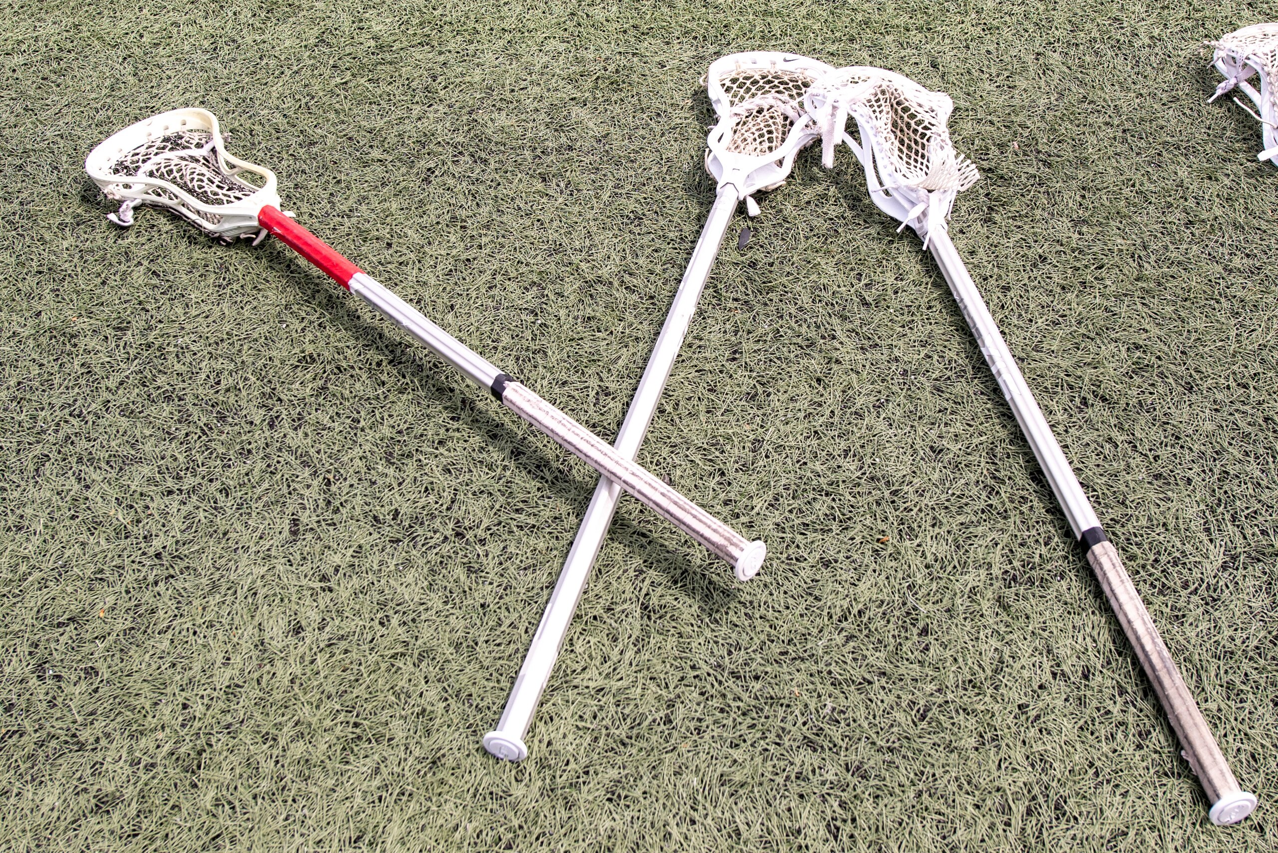 PROVIDENCE, RI - MAY 08: A general view of lacrosse sticks on the sideline during halftime of the Ivy League Tournament championship college lacrosse game between the Pennsylvania Quakers and the Yale Bulldogs on May 8, 2022, at Stevenson-Pincince Field in Providence, RI. (Photo by Erica Denhoff/Icon Sportswire via Getty Images)