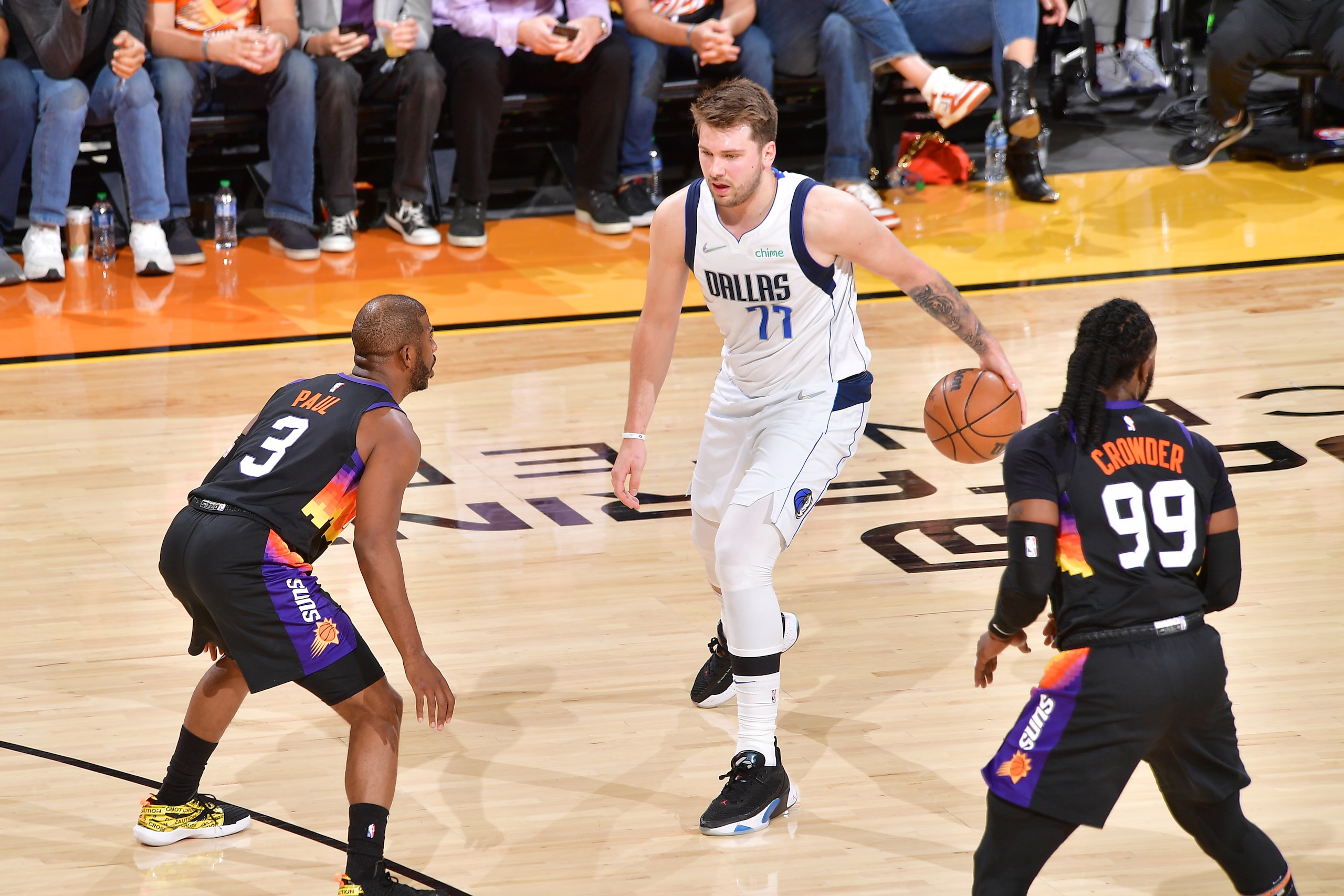 PHOENIX, AZ - MAY 10: Luka Doncic #77 of the Dallas Mavericks dribbles the ball during the game against the Phoenix Suns during Game 5 of the 2022 NBA Playoffs Western Conference Semifinals on May 10, 2022 at Footprint Center in Phoenix, Arizona. NOTE TO USER: User expressly acknowledges and agrees that, by downloading and or using this photograph, user is consenting to the terms and conditions of the Getty Images License Agreement. Mandatory Copyright Notice: Copyright 2022 NBAE (Photo by Michael Gonzales/NBAE via Getty Images)