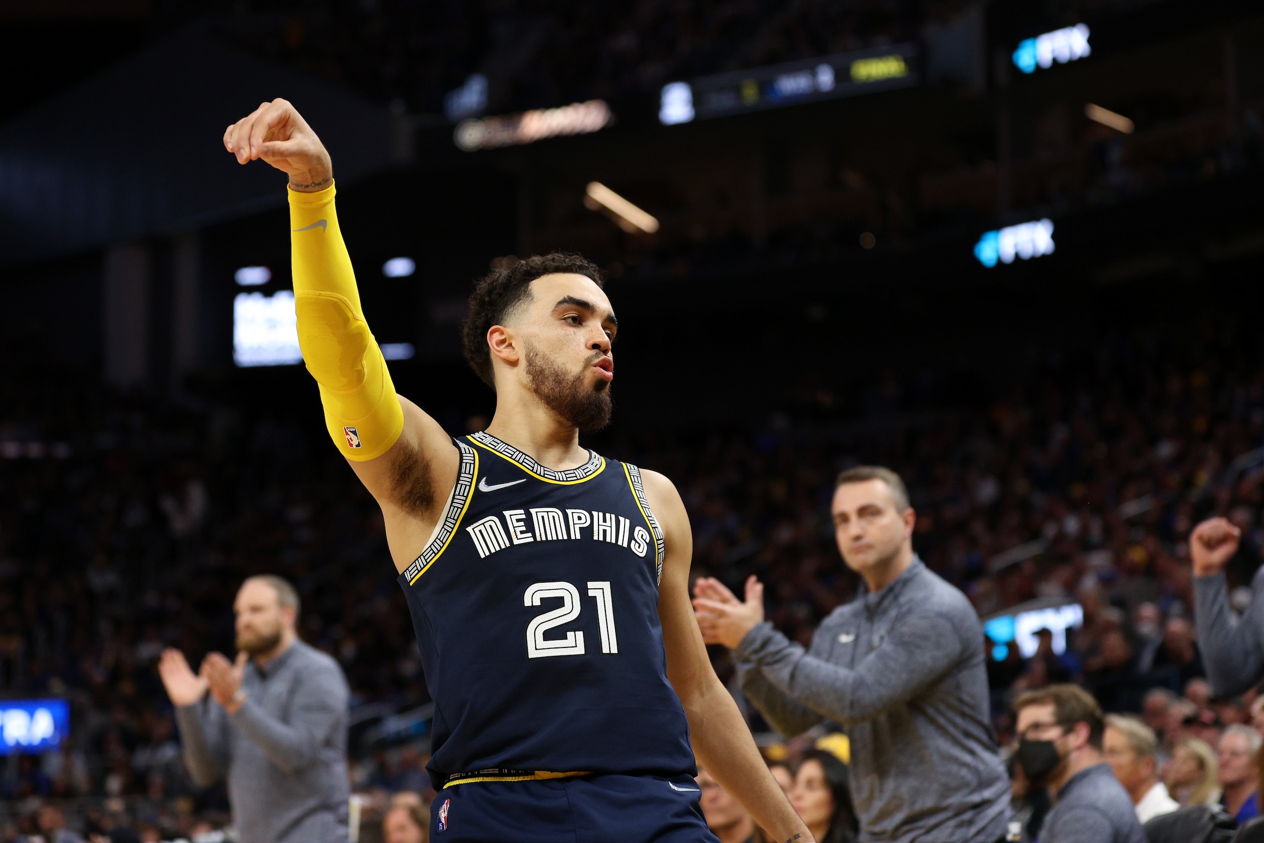 SAN FRANCISCO, CALIFORNIA - MAY 09: Tyus Jones #21 of the Memphis Grizzlies reacts after making a basket during the second half of Game Four of the Western Conference Semifinals of the NBA Playoffs against the Golden State Warriors at Chase Center on May 09, 2022 in San Francisco, California. NOTE TO USER: User expressly acknowledges and agrees that, by downloading and/or using this photograph, User is consenting to the terms and conditions of the Getty Images License Agreement. (Photo by Ezra Shaw/Getty Images)