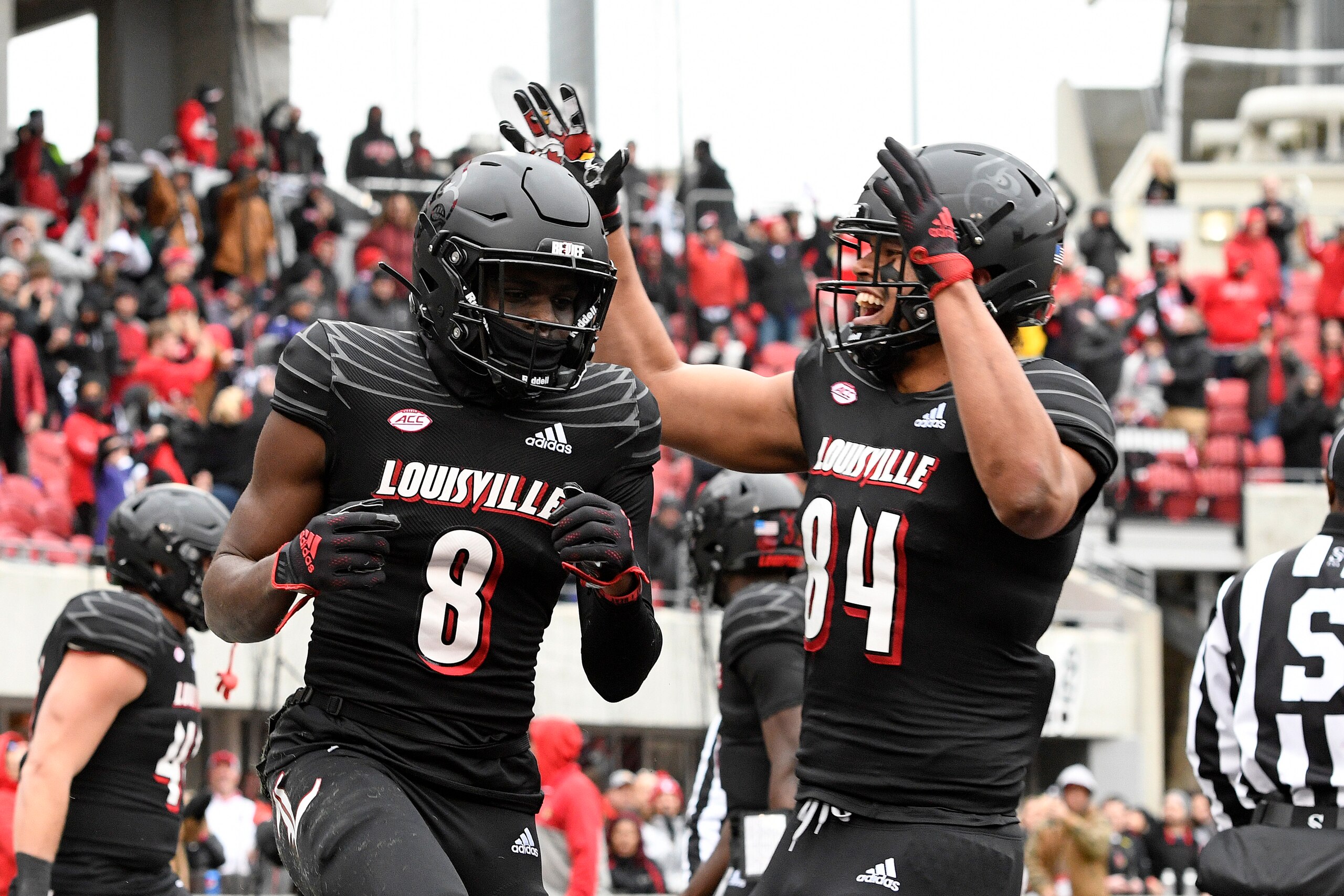 LOUISVILLE, KY - NOVEMBER 13: Louisville Cardinals wide receiver Tyler Harrell (8) and Louisville Cardinals tight end Dez Melton (84) celebrate after a touchdown during the college football game between the Syracuse Orange and the Louisville Cardinals on November 13, 2021, at Cardinal Stadium in Louisville, Kentucky. (Photo by Michael Allio/Icon Sportswire via Getty Images) LOUISVILLE, KY - NOVEMBER 13: Louisville Cardinals wide receiver Tyler Harrell (8) and Louisville Cardinals tight end Dez Melton (84) celebrate after a touchdown during the college football game between the Syracuse Orange and the Louisville Cardinals on November 13, 2021, at Cardinal Stadium in Louisville, Kentucky. (Photo by Michael Allio/Icon Sportswire via Getty Images)