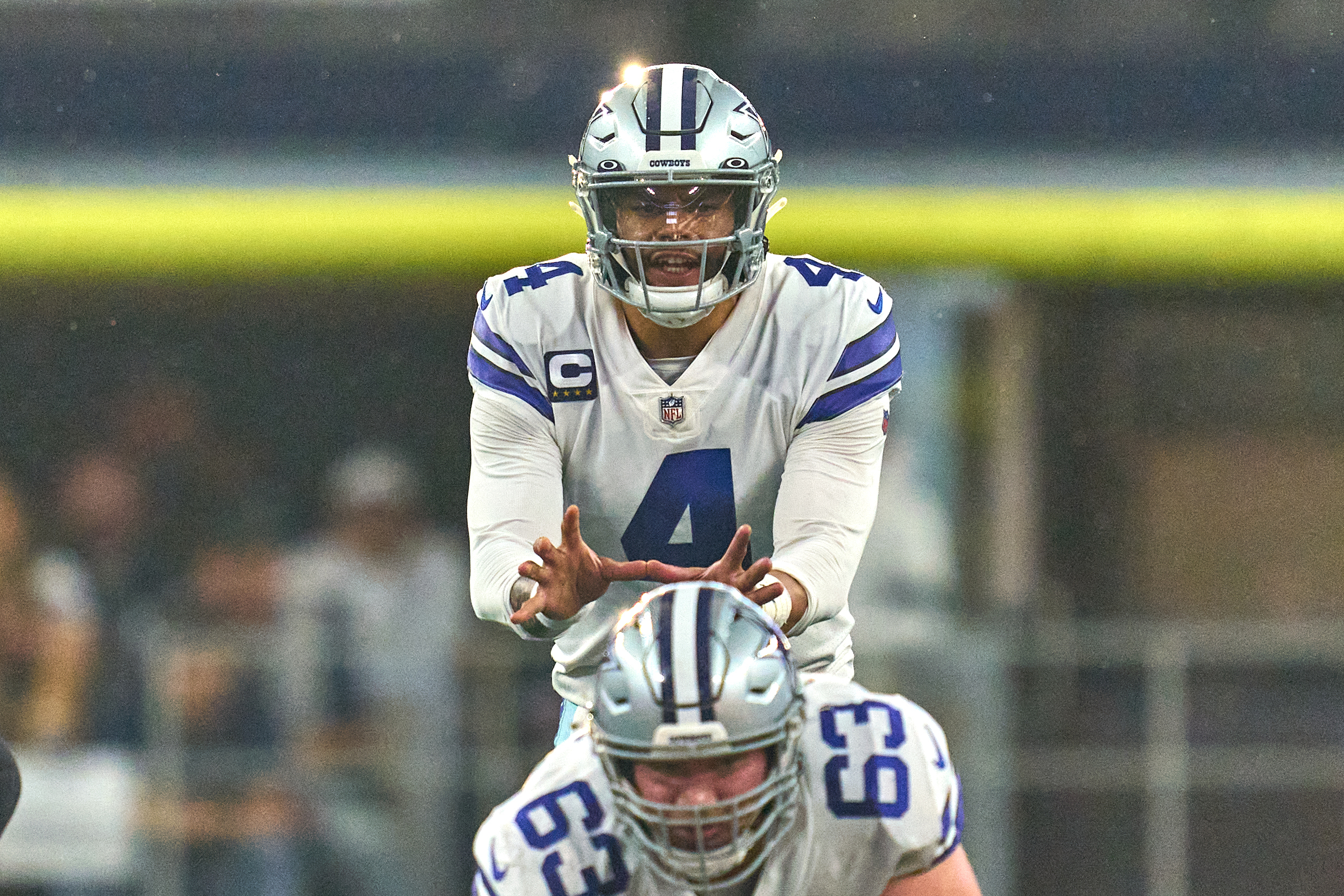ARLINGTON, TX - JANUARY 16: Dallas Cowboys quarterback Dak Prescott (4) looks to take the snap during the NFC Wild Card game between the San Francisco 49ers and the Dallas Cowboys on January 16, 2022 at AT&T Stadium in Arlington, TX. (Photo by Robin Alam/Icon Sportswire via Getty Images)