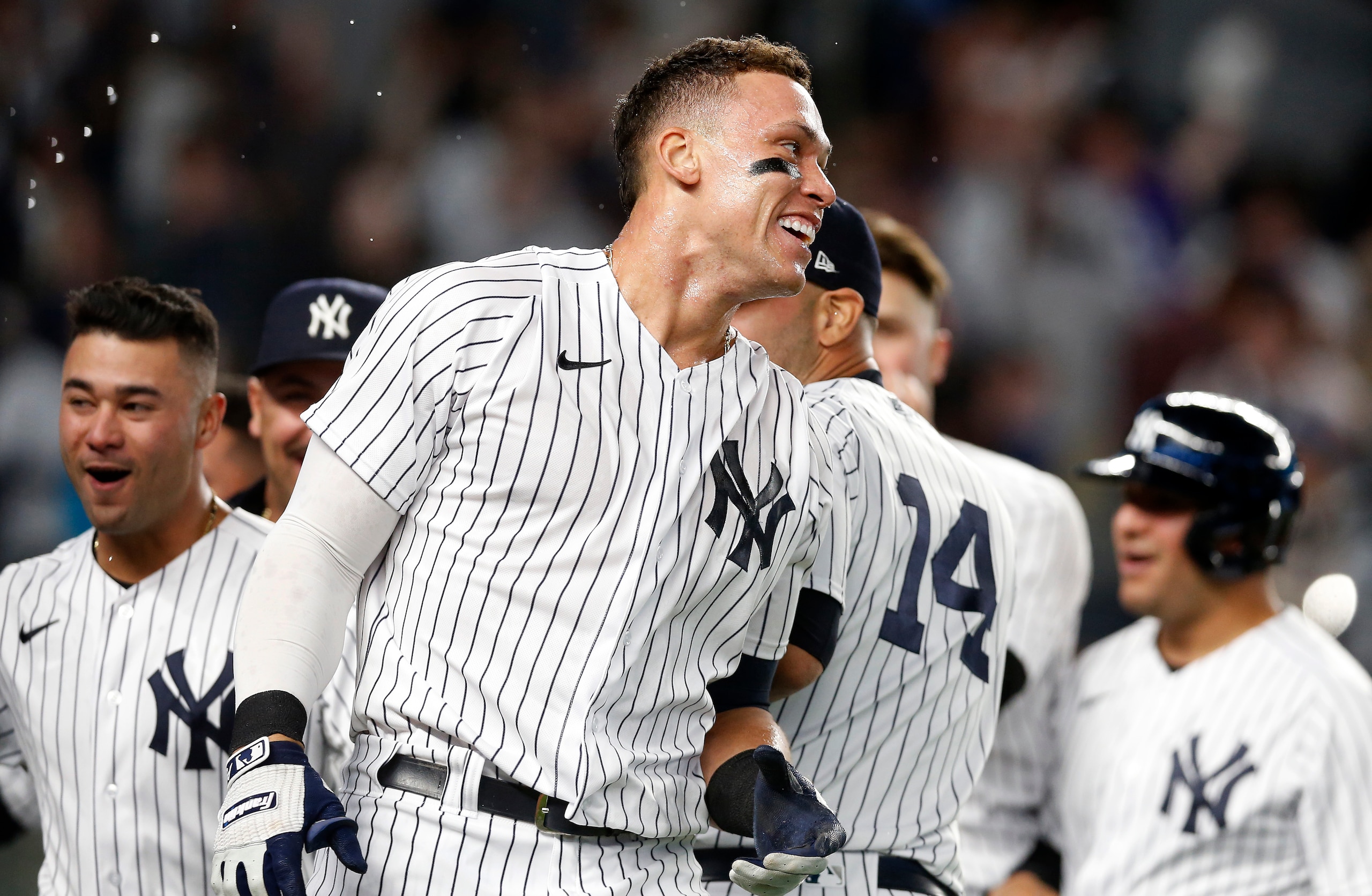 NEW YORK, NEW YORK - MAY 10:  Aaron Judge #99 of the New York Yankees celebrates with his teammates after his ninth inning game winning three run home run against the Toronto Blue Jays at Yankee Stadium on May 10, 2022 in New York City. (Photo by Jim McIsaac/Getty Images)