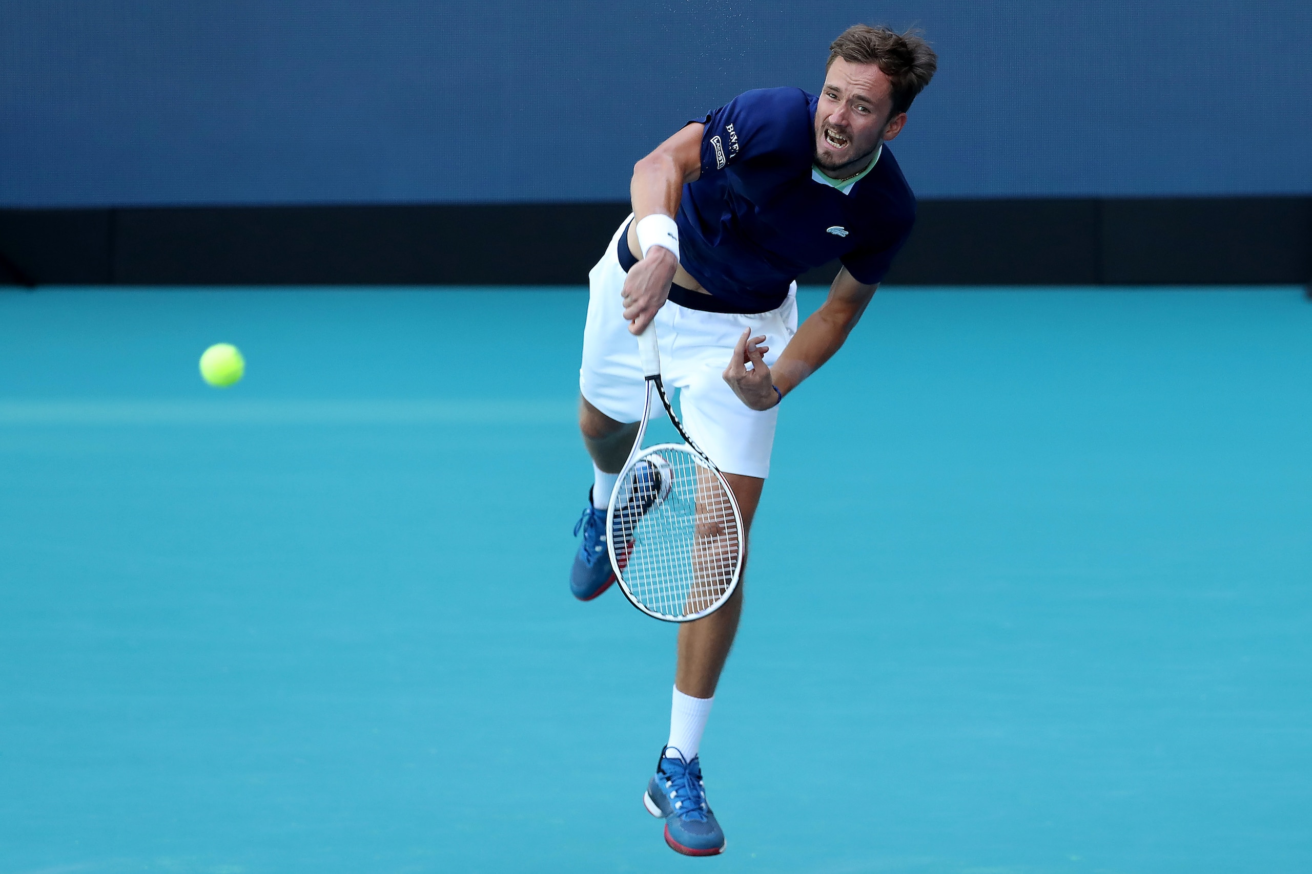 MIAMI GARDENS, FLORIDA - MARCH 29: Daniil Medvedev of Russia serves to Jensen Brooksby during the Men's Singles match on Day 9 of the 2022 Miami Open presented by Itaú at Hard Rock Stadium on March 29, 2022 in Miami Gardens, Florida. (Photo by Megan Briggs/Getty Images)