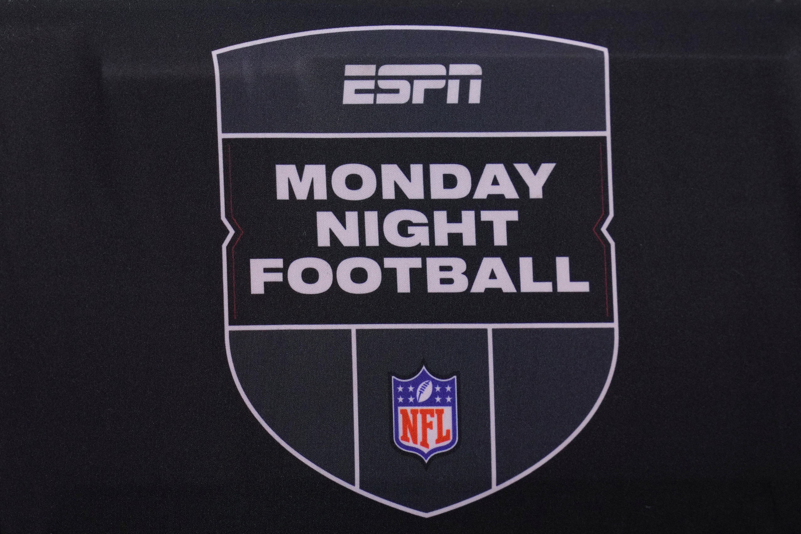 PHILADELPHIA, PA - JANUARY 08: A detailed views of the ESPN Monday Night Football logo during the game between the Dallas Cowboys and Philadelphia Eagles at Lincoln Financial Field on January 8, 2022 in Philadelphia, Pennsylvania. (Photo by Mitchell Leff/Getty Images) PHILADELPHIA, PA - JANUARY 08: A detailed views of the ESPN Monday Night Football logo during the game between the Dallas Cowboys and Philadelphia Eagles at Lincoln Financial Field on January 8, 2022 in Philadelphia, Pennsylvania. (Photo by Mitchell Leff/Getty Images)