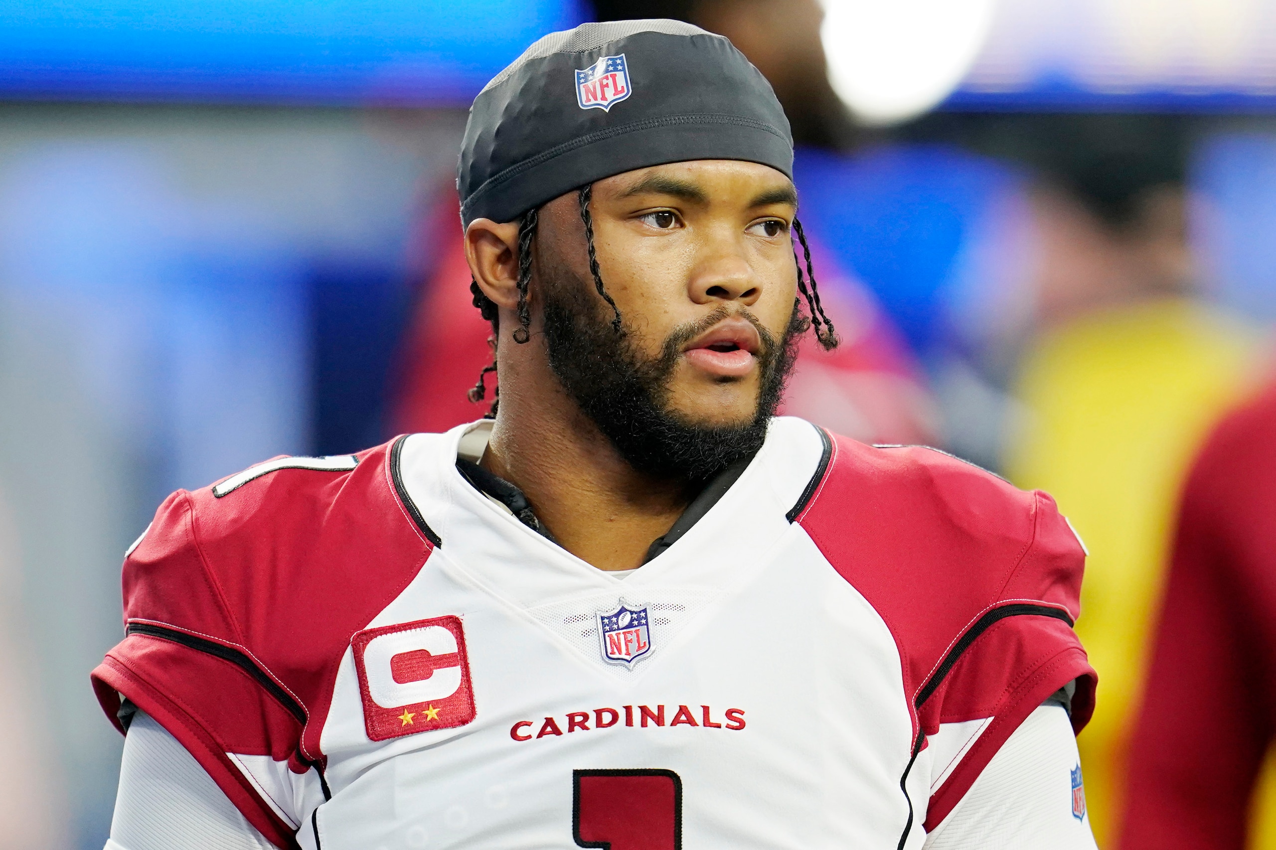 FILE - Arizona Cardinals quarterback Kyler Murray (1) warms up before an NFL wild-card playoff football game against the Los Angeles Rams in Inglewood, Calif., Jan. 17, 2022. The Cardinals appeared to be one of the more stable franchises in the NFL just six months ago. That changed a little after a late-season collapse and a passive-aggressive contract spat between Murray and the team’s front office brought some drama to the desert. (AP Photo/Marcio Jose Sanchez, File)