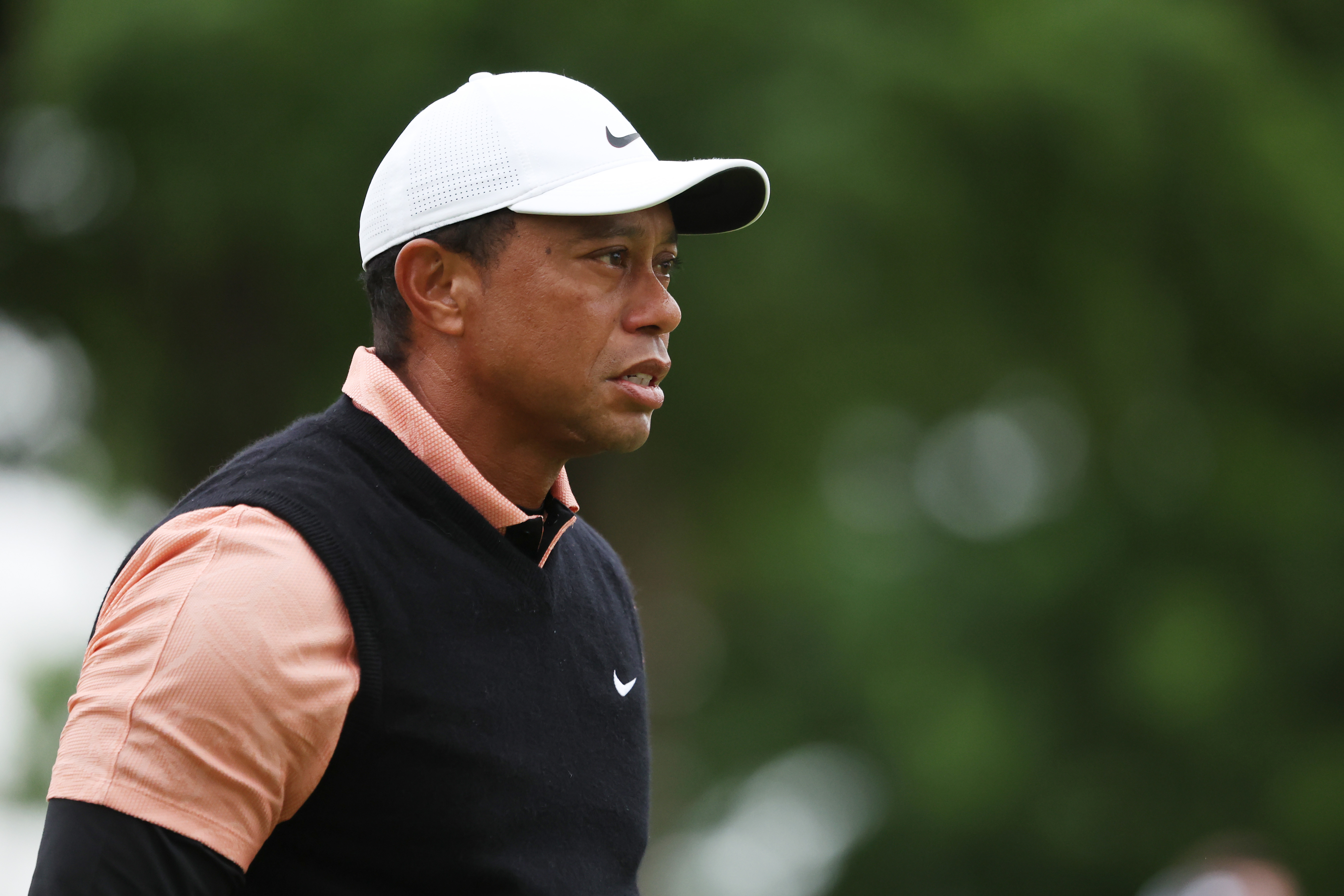 TULSA, OKLAHOMA - MAY 21: Tiger Woods of the United States reacts to his tee shot on the second hoel during the third round of the 2022 PGA Championship at Southern Hills Country Club on May 21, 2022 in Tulsa, Oklahoma. (Photo by Maddie Meyer/PGA of America/PGA of America via Getty Images )