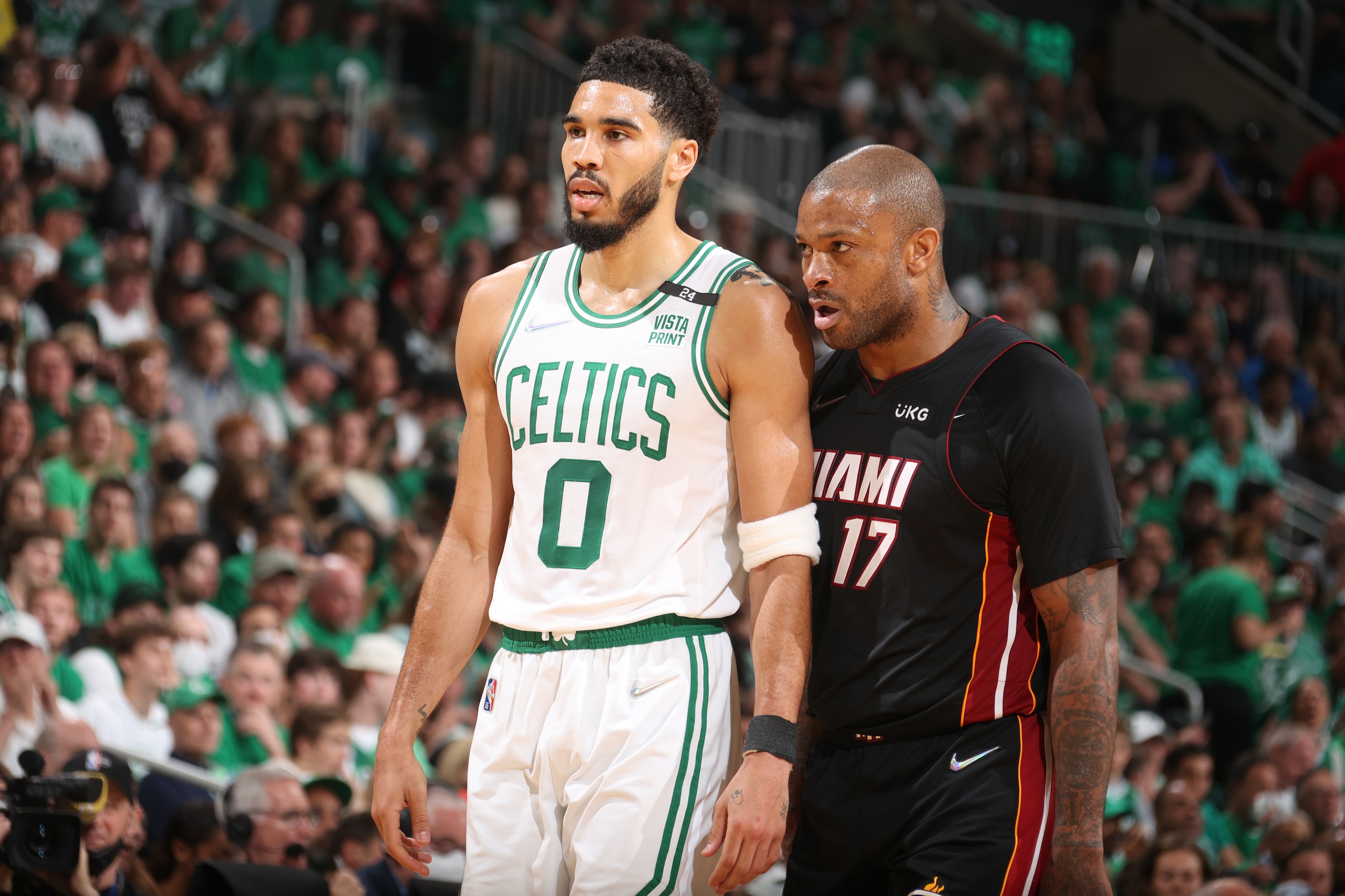 BOSTON, MA - MAY 21: Jayson Tatum #0 of the Boston Celtics and P.J. Tucker #17 of the Miami Heat look on during Game 3 of the 2022 NBA Playoffs Eastern Conference Finals on May 21, 2022 at the TD Garden in Boston, Massachusetts. NOTE TO USER: User expressly acknowledges and agrees that, by downloading and or using this photograph, User is consenting to the terms and conditions of the Getty Images License Agreement. Mandatory Copyright Notice: Copyright 2022 NBAE (Photo by Nathaniel S. Butler/NBAE via Getty Images) BOSTON, MA - MAY 21: Jayson Tatum #0 of the Boston Celtics and P.J. Tucker #17 of the Miami Heat look on during Game 3 of the 2022 NBA Playoffs Eastern Conference Finals on May 21, 2022 at the TD Garden in Boston, Massachusetts. NOTE TO USER: User expressly acknowledges and agrees that, by downloading and or using this photograph, User is consenting to the terms and conditions of the Getty Images License Agreement. Mandatory Copyright Notice: Copyright 2022 NBAE (Photo by Nathaniel S. Butler/NBAE via Getty Images)