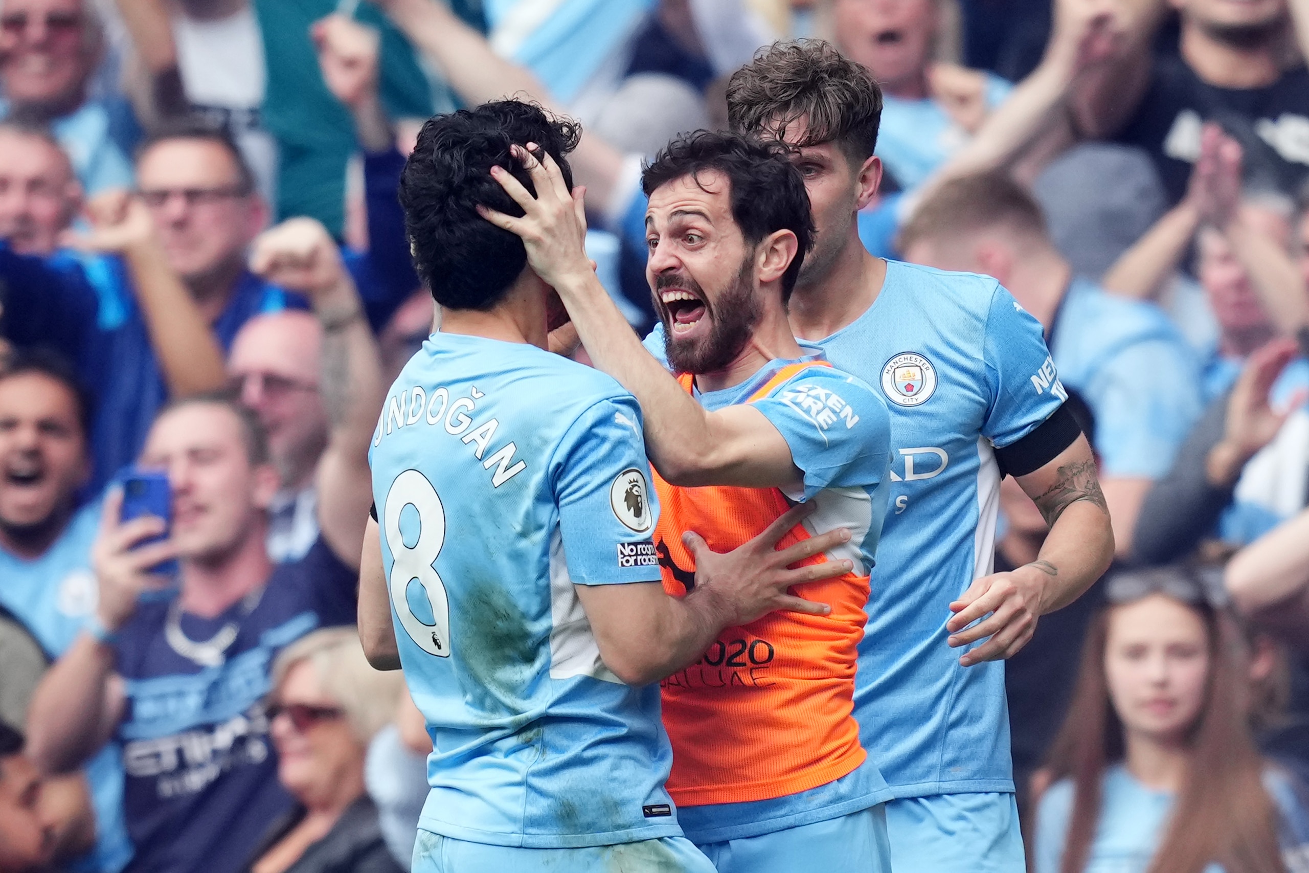 MANCHESTER, ENGLAND - MAY 22: Ilkay Guendogan celebrates with Bernardo Silva of Manchester City after scoring their team's third goal during the Premier League match between Manchester City and Aston Villa at Etihad Stadium on May 22, 2022 in Manchester, England. (Photo by Matt McNulty - Manchester City/Manchester City FC via Getty Images)